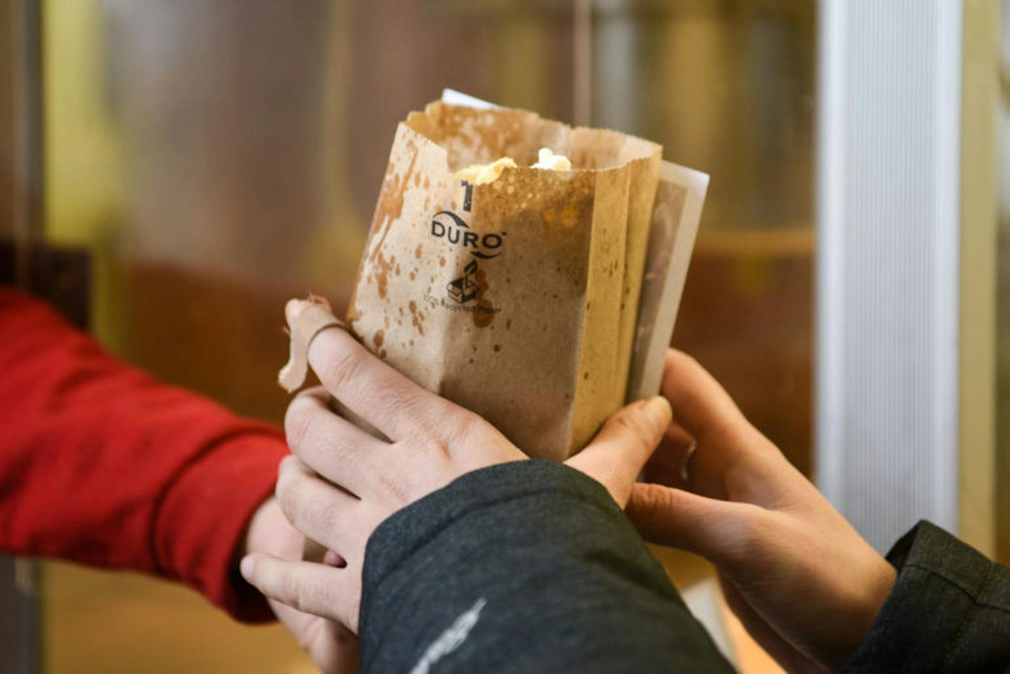 A student drops by the Willard Straight Hall Resource Center for popcorn on Thursday. (Boris Tsang / Sun Assistant Photography Editor)