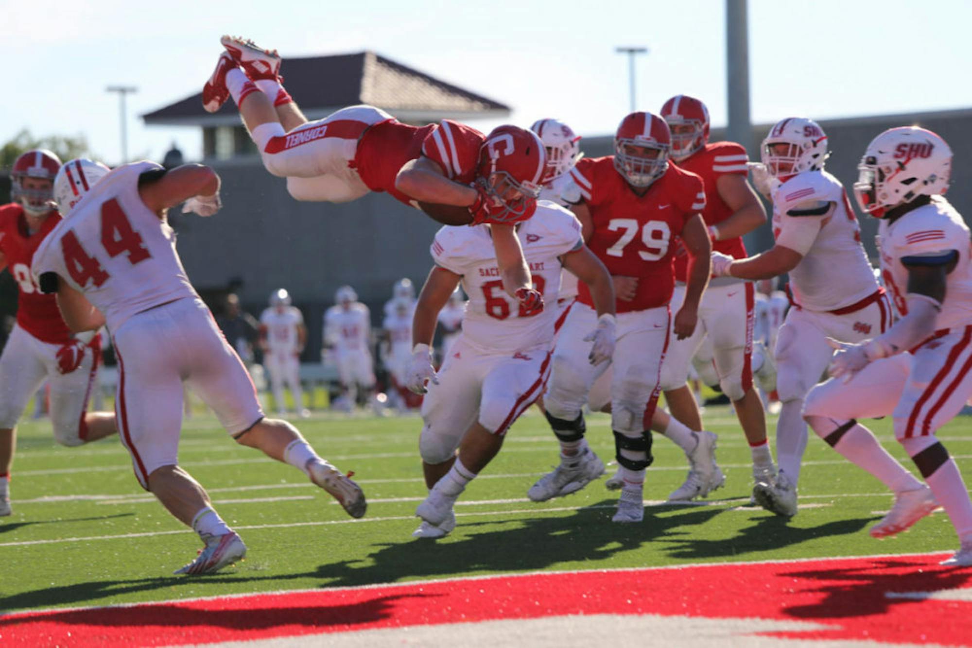 J.D. PicKell soars for a touchdown against Yale in a Homecoming win for Cornell last year.