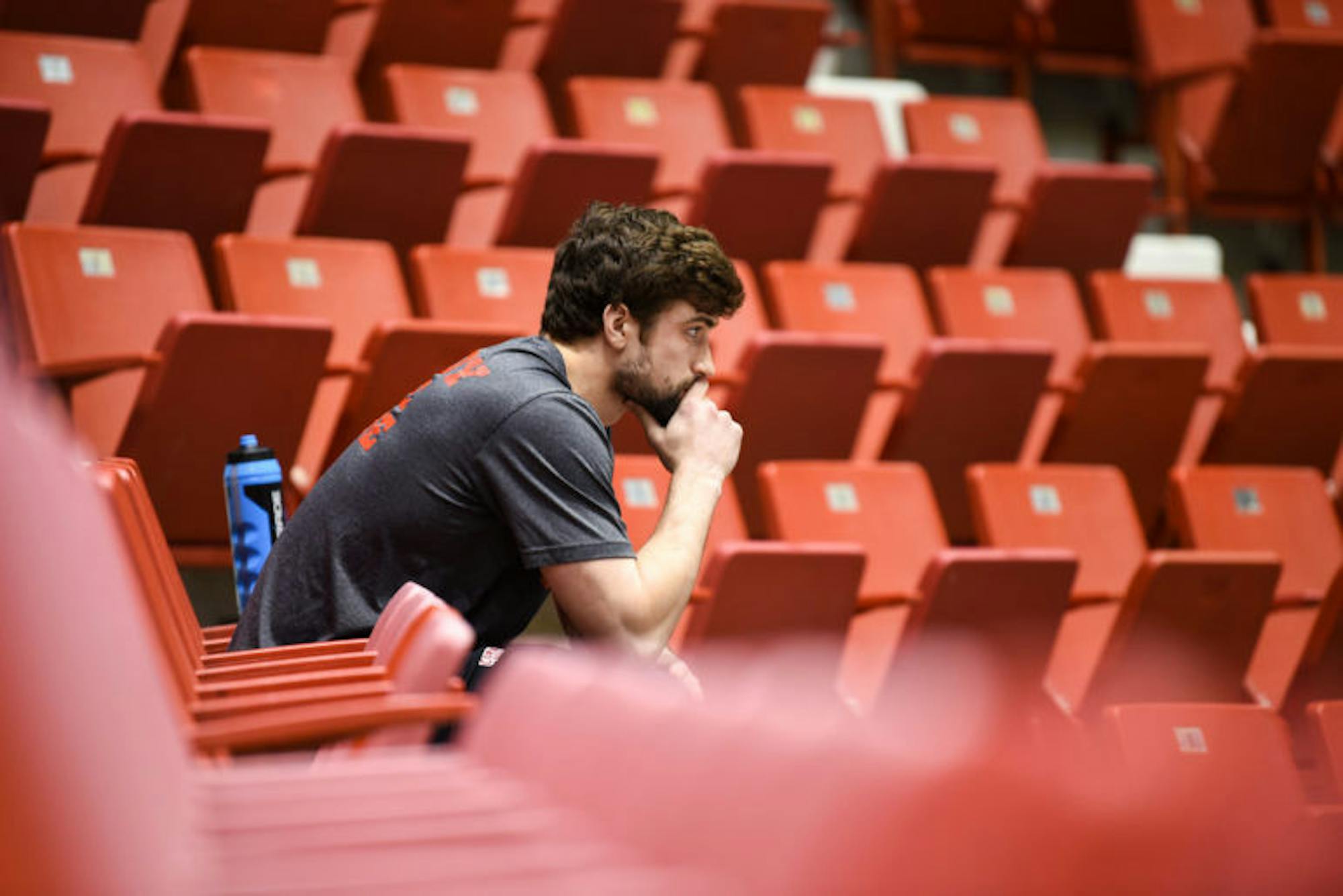 Senior defenseman Matt Nuttle sits in silence before the ECAC championship game on Saturday. The Red lost the final against Clarkson, 3-2, in overtime. (Boris Tsang / Sun Photography Editor)