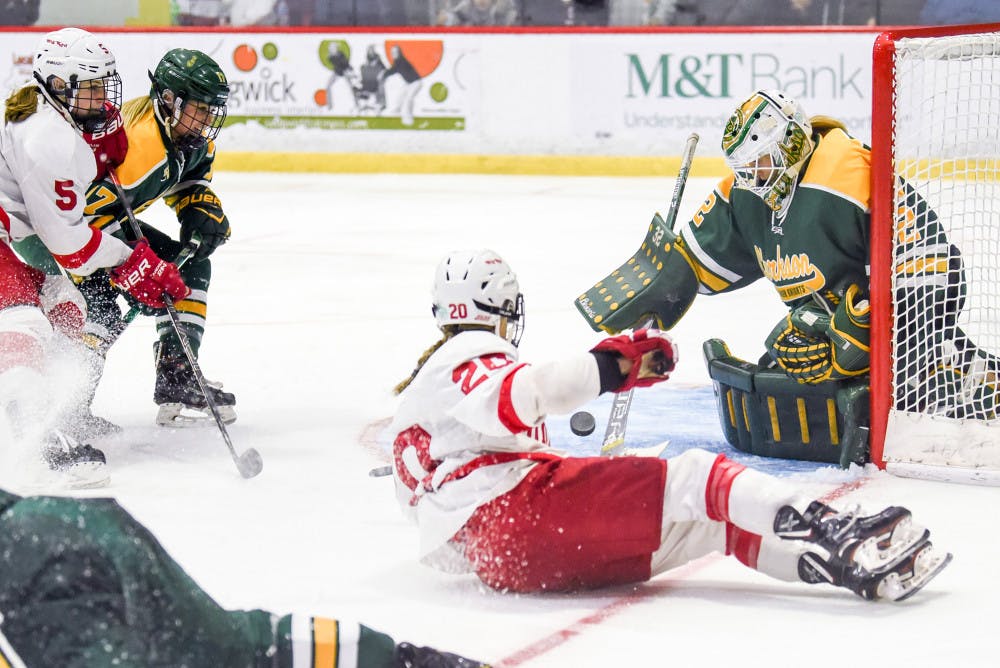 Pg-12-W-Hockey-Boris-Tsang-Sun-Photo-Editor