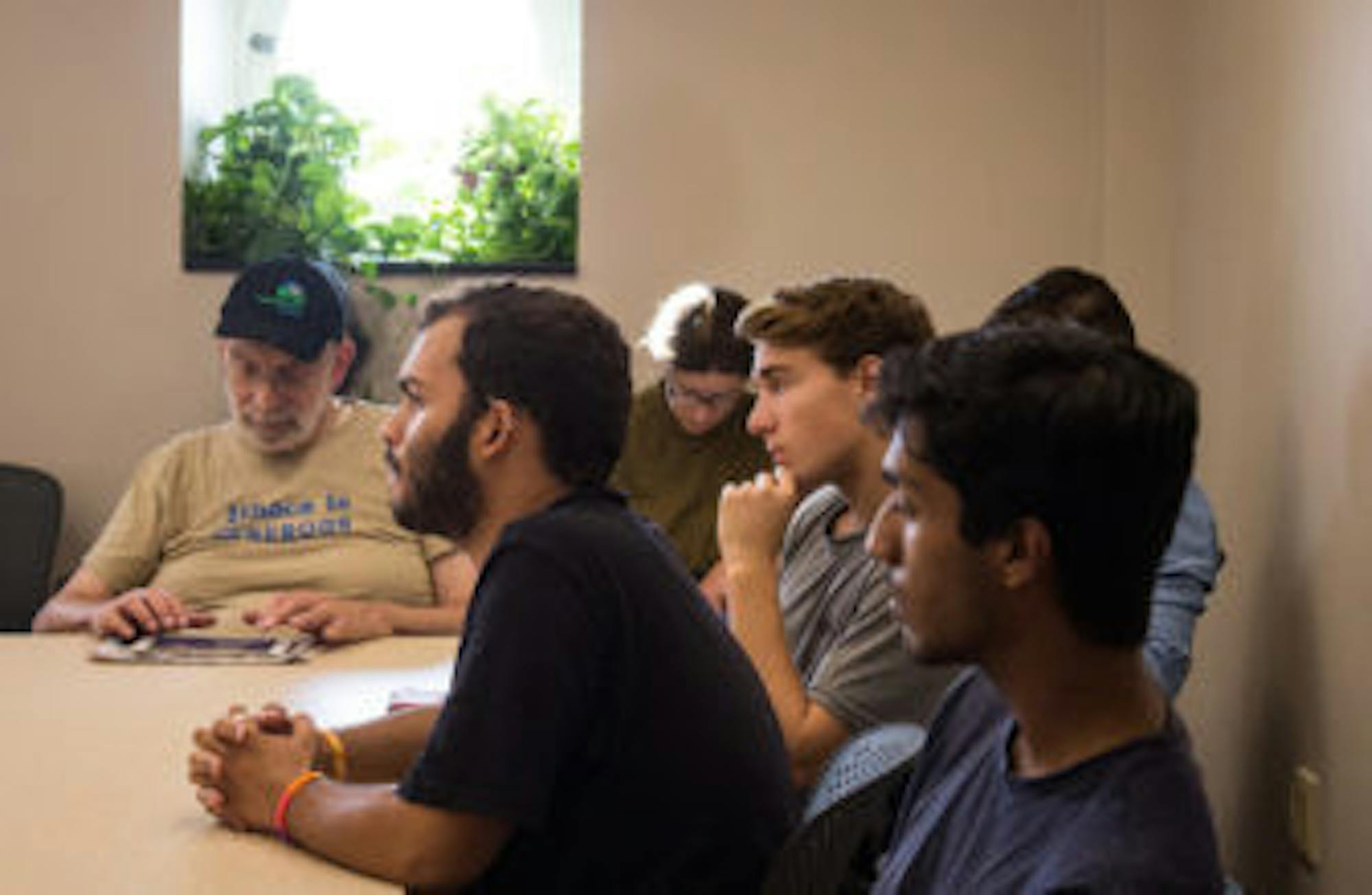 Students and faculty listen intently to Alidou at her seminar.
