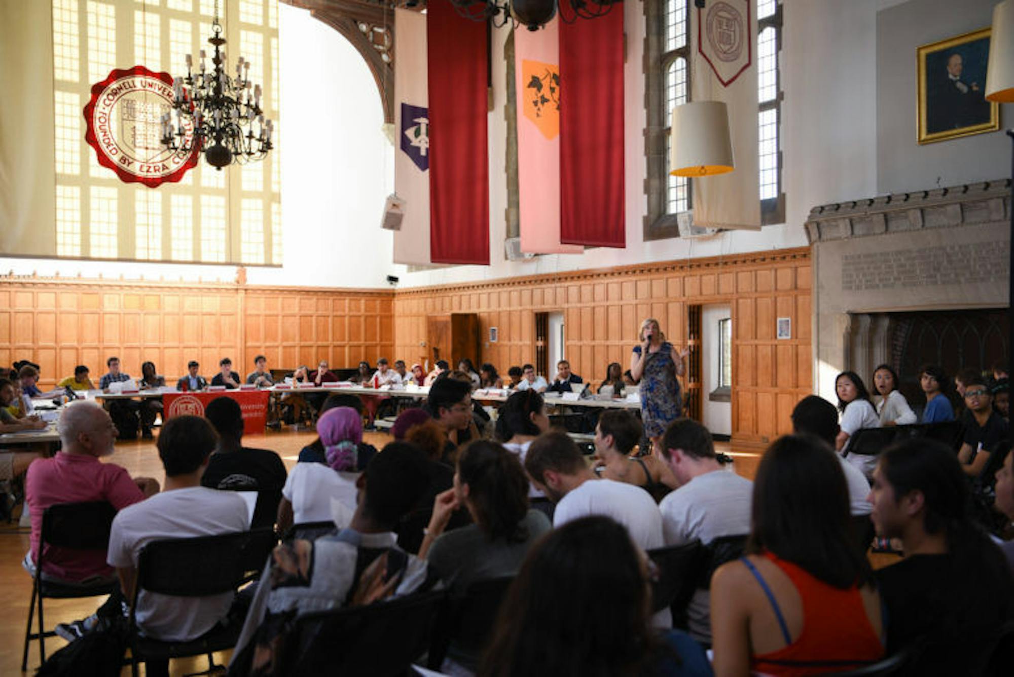 At the Student Assembly meeting on Thursday, Mary Beth Grant J.D. ’88, senior dean of students, faced pointed questions from impassioned students regarding the recent security policy changes, which required student groups to pay security fees for events that did not previously require security. (Boris Tsang / Sun Assistant Photography Editor)
