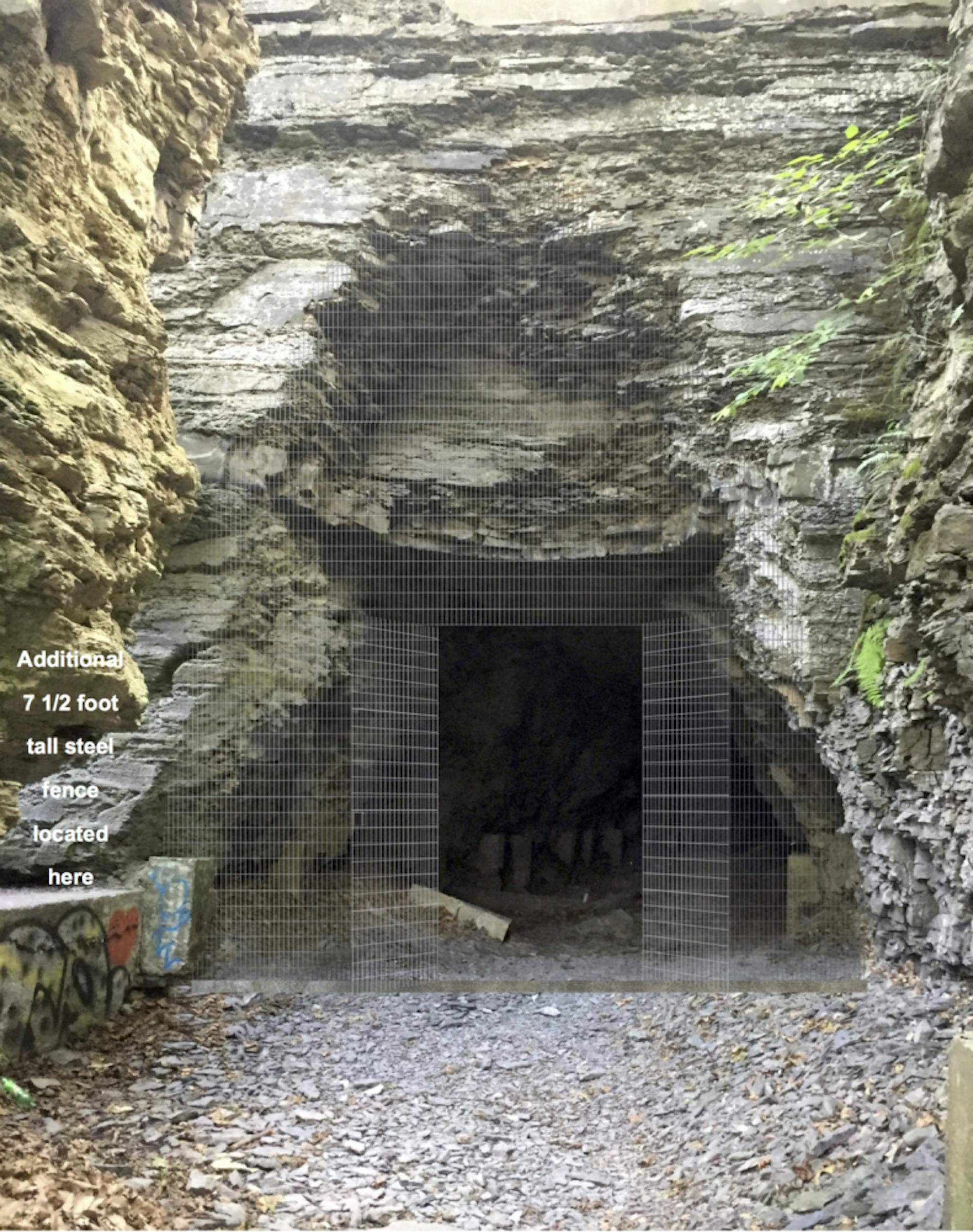 A mock-up of the gate proposed by Cornell in front of Ezra's Tunnel. The 16-foot steel gate will be black, but was made silver in this mock-up to be visible.