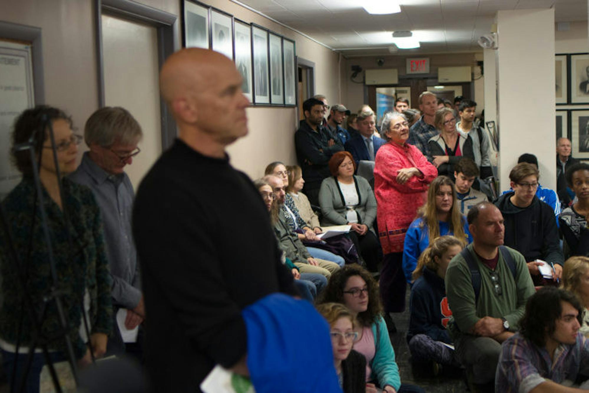People crowd Ithaca City Hall at the Common Council meeting on Wednesday, Nov. 1, to hear the final verdict on the Chacona Block's historical designation.