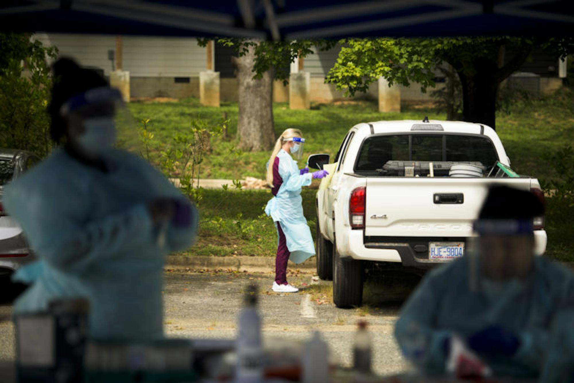 Medical staff test patients for COVID-19 at The University of North Carolina at Chapel Hill on Aug. 28.