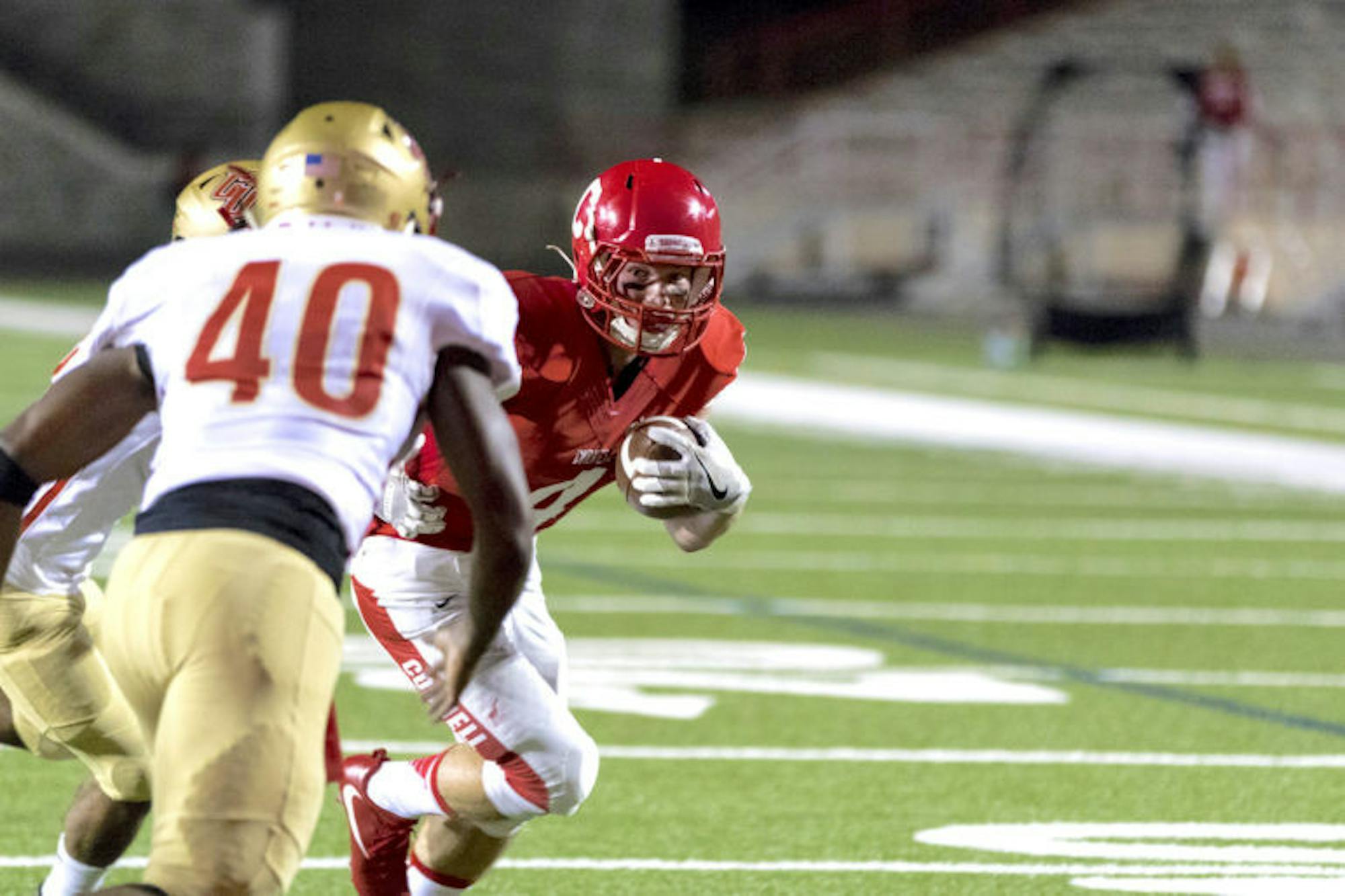 Cornell wins 48-20 on Friday vs. Caldwell University. Above, Will Griffen rushes for a touchdown. (Jason Ben Nathan / Sun Senior Photographer)