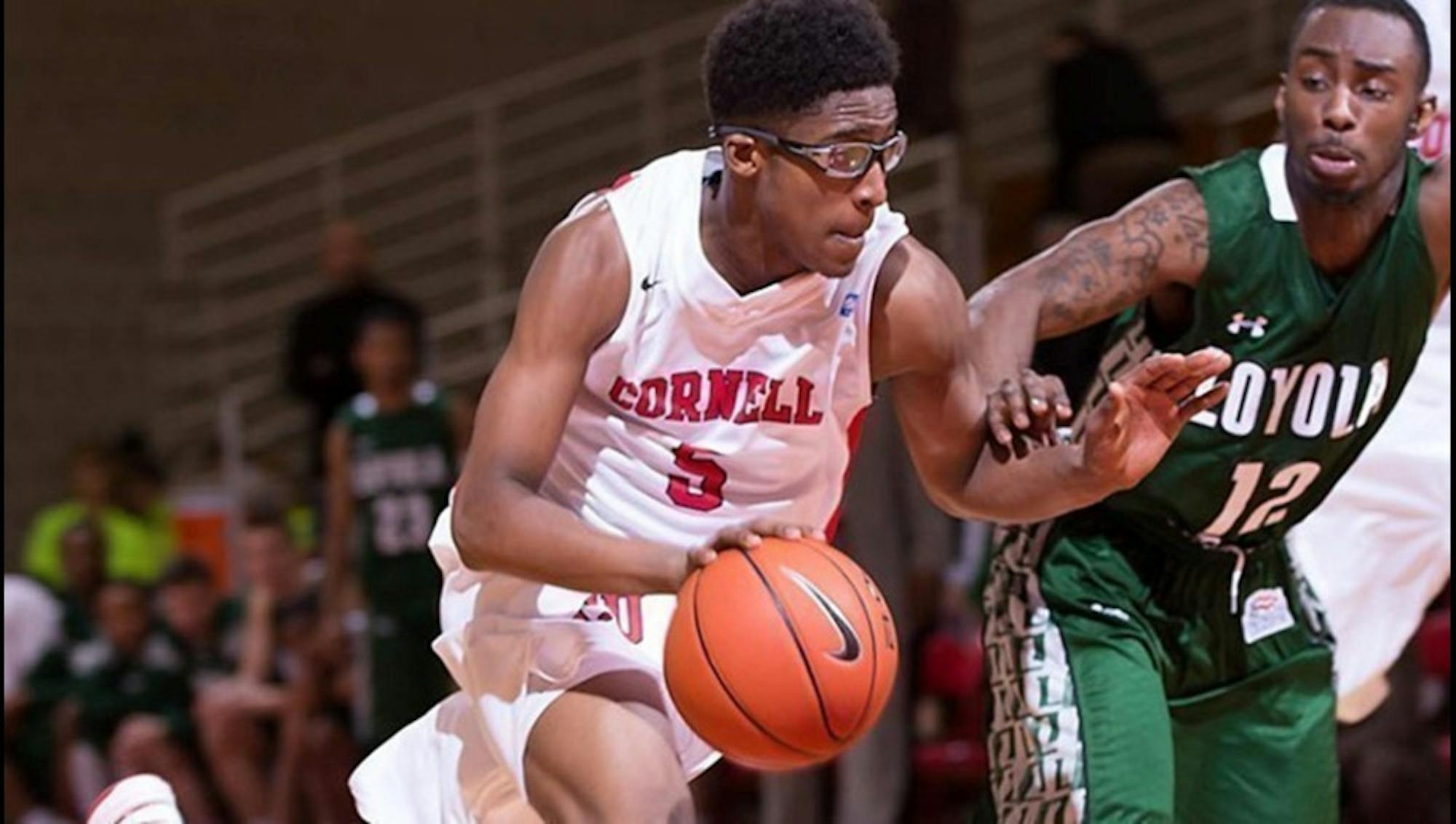 Junior Robert Hatter made a layup with 2 seconds left to give Team White the victory over Team Red in an exhibition game.