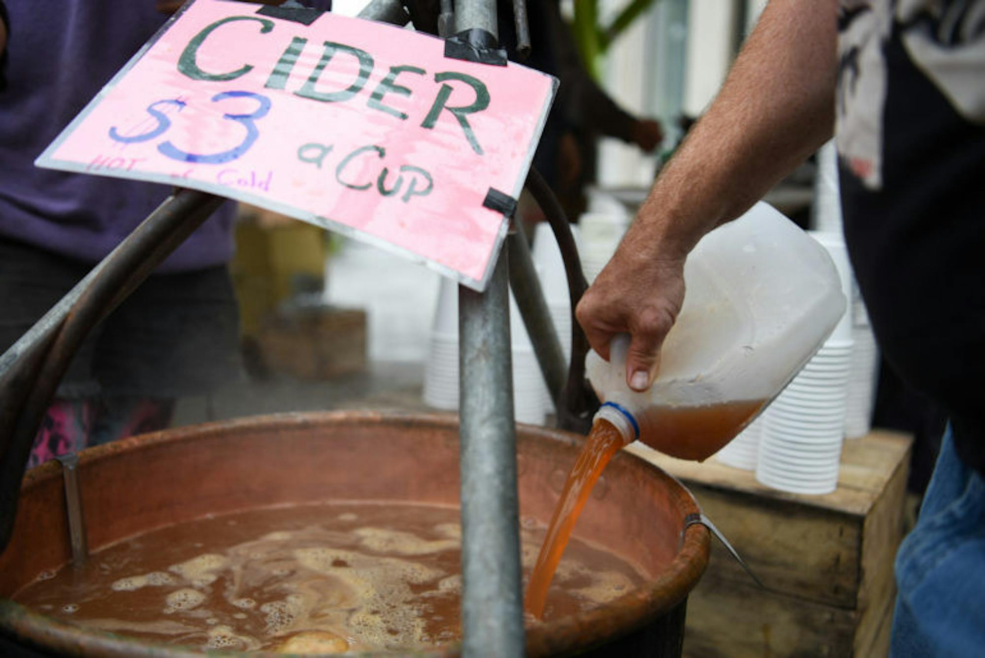 At the 36th Annual Downtown Ithaca Apple Harvest Festival, local farmers gathered to sell a wide variety of apples, apple beverages, and baked goods. (Boris Tsang / Sun Assistant Photography Editor)