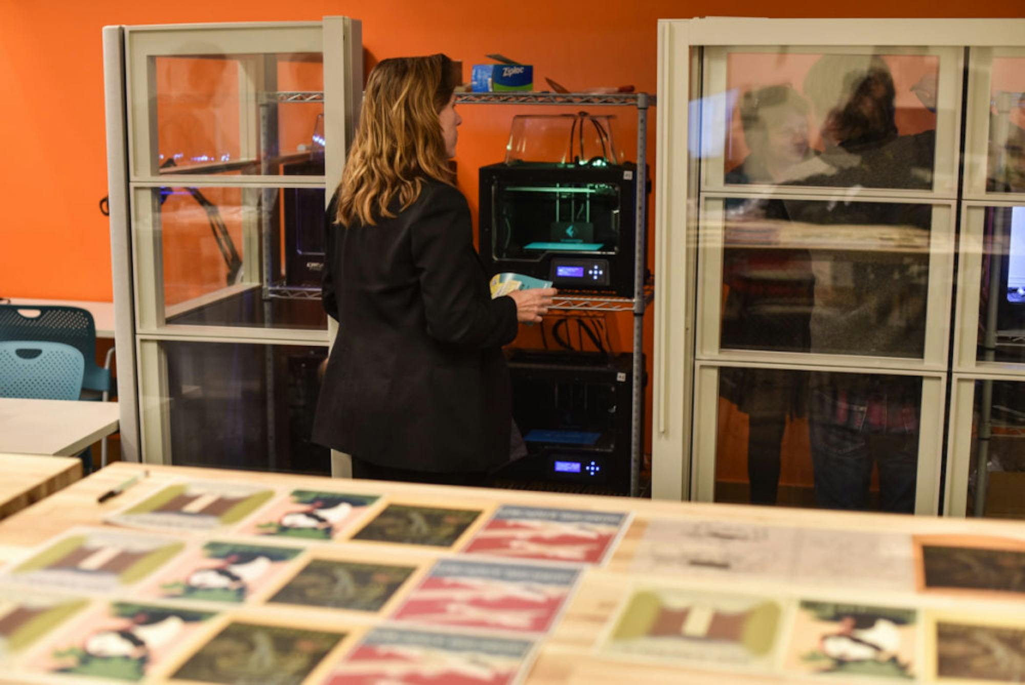 A participant at MannUfactory 3-D prints.