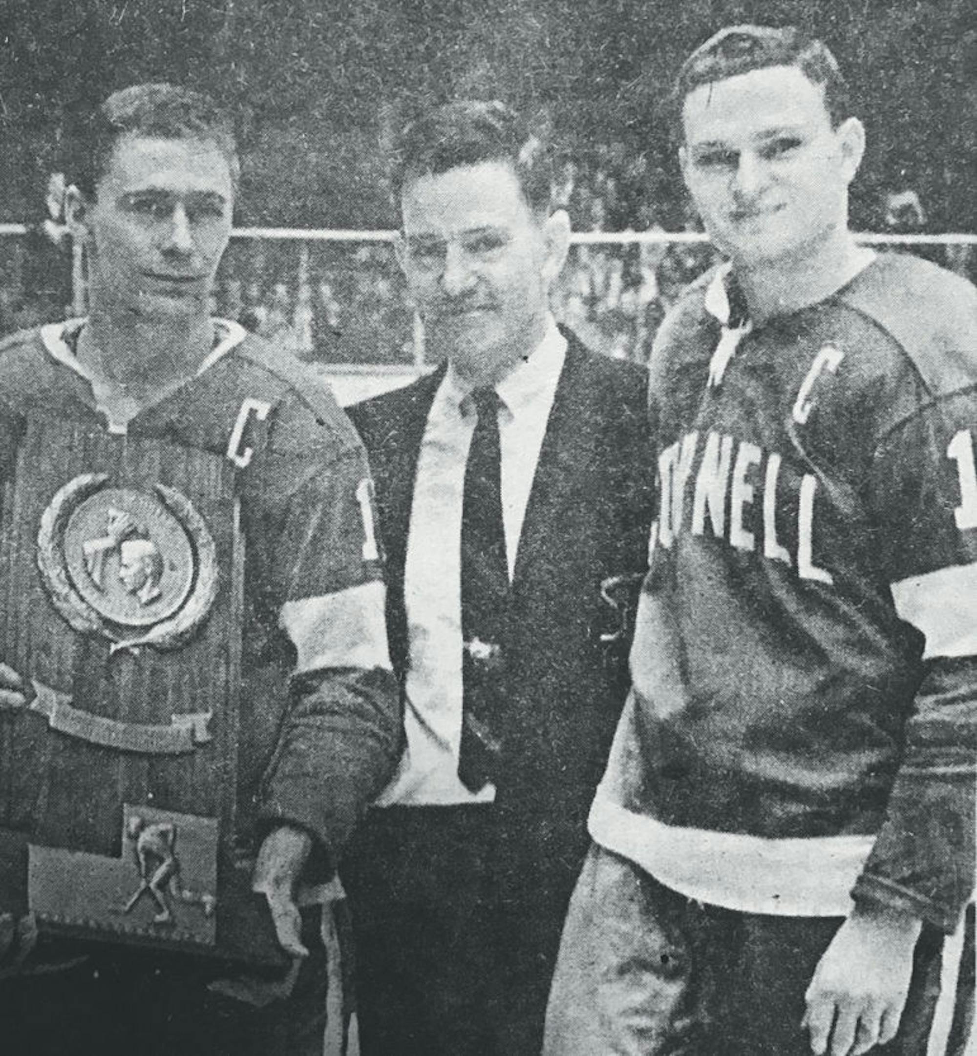 Ned Harkness (middle) is cemented as one of collegiate sports' most storied head coaches, leading Cornell and RPI to several championships among multiple sports.