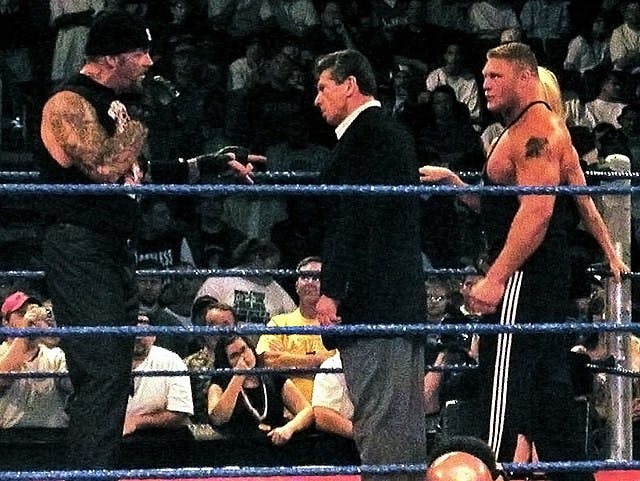 Undertaker_Vince_McMahon_Brock_Lesnar__Sable_in_a_WWE_ring