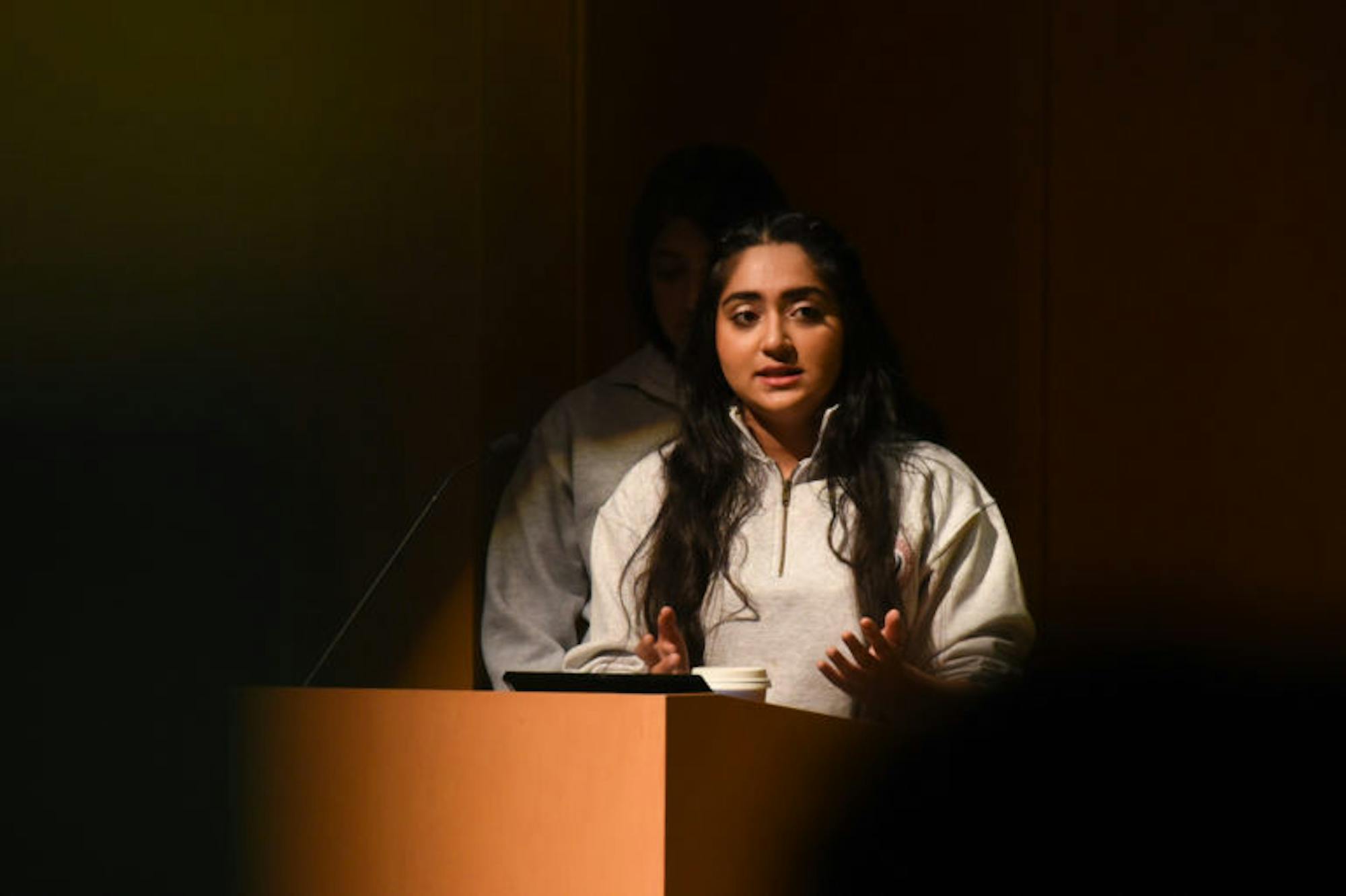 Sukhmani Kaur ’21, president of the Cornell Sikh Students Association, speaks at the the “Candle Night Gathering for Storytelling and Solidarity” event on Wednesday. The gathering gave minority organizations on campus the opportunity to share their stories and the challenges they face through a variety of performances. (Alice Song / Sun Staff Photographer)