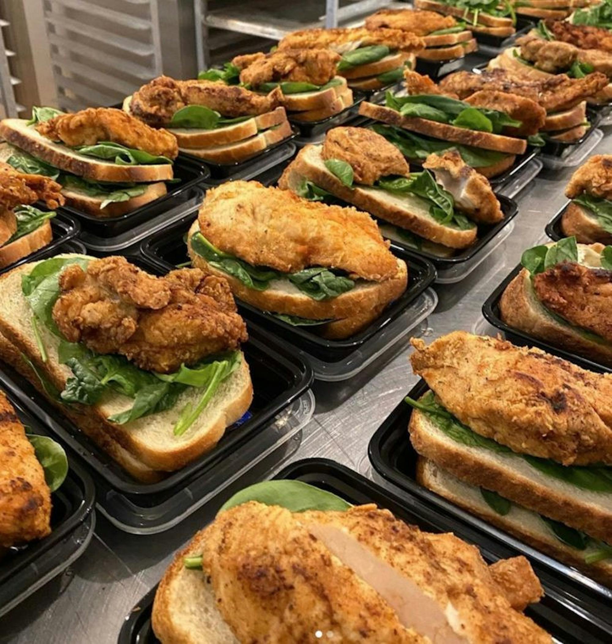 Preperation for meal service during the pandemic. (Amelia Clute, Sun Staff Writer)