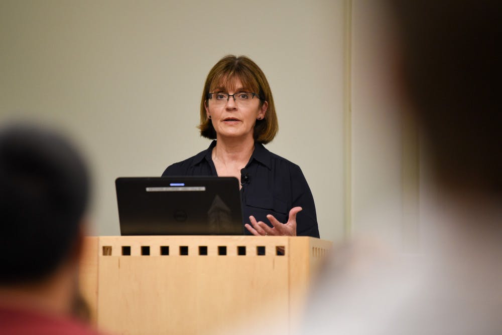 Pg-4-Refugee-Talk-by-Boris-Tsang-Sun-Photography-Editor