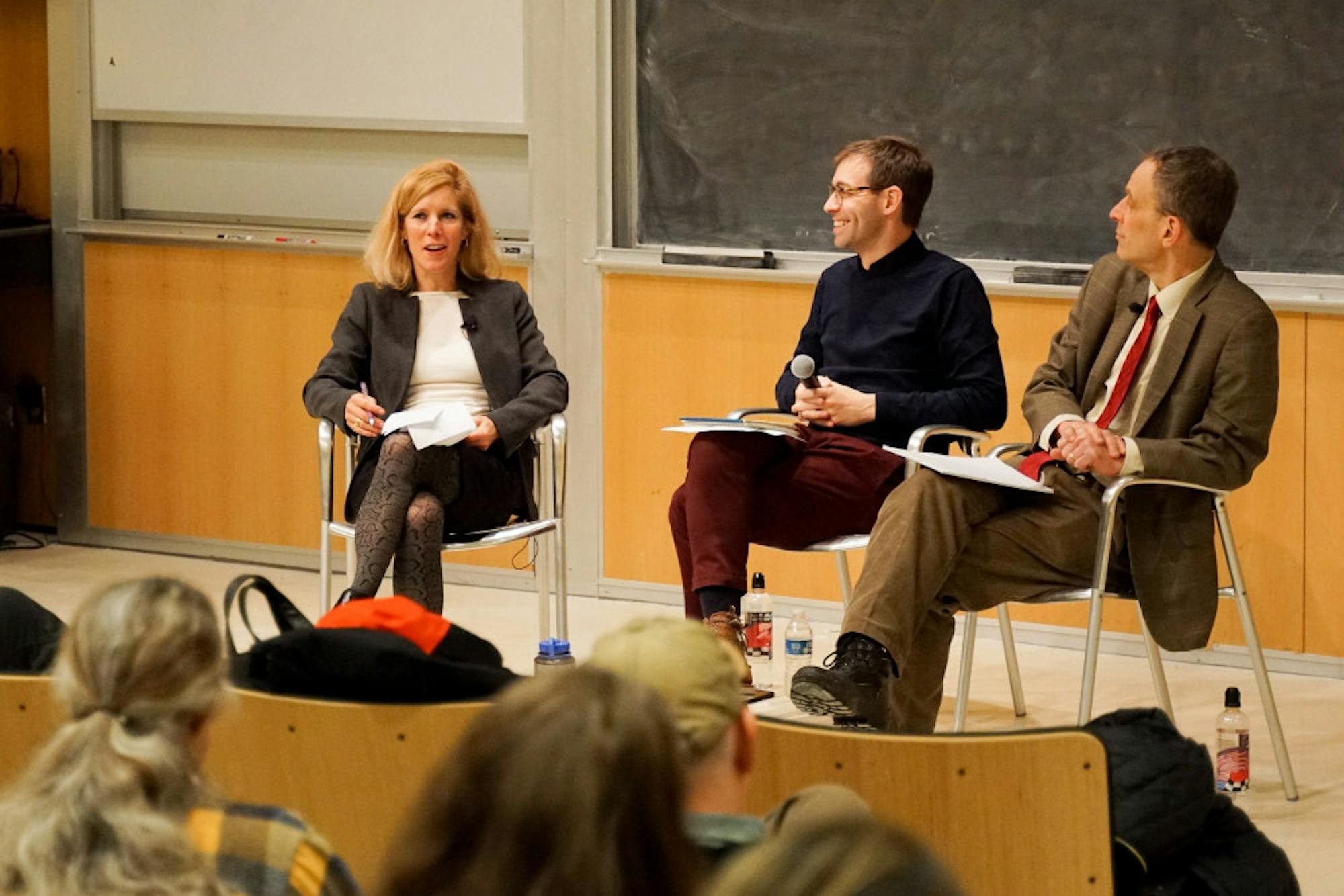 Professor Michael Dorf, law, and Professor Sarah Kreps, government, on Wednesday night debated the legal and political concerns surrounding the third-ever impeachment. The talk was moderated by Prof. David Bateman, government. (Michelle Zhiqing Yang/Sun Staff Photographer)