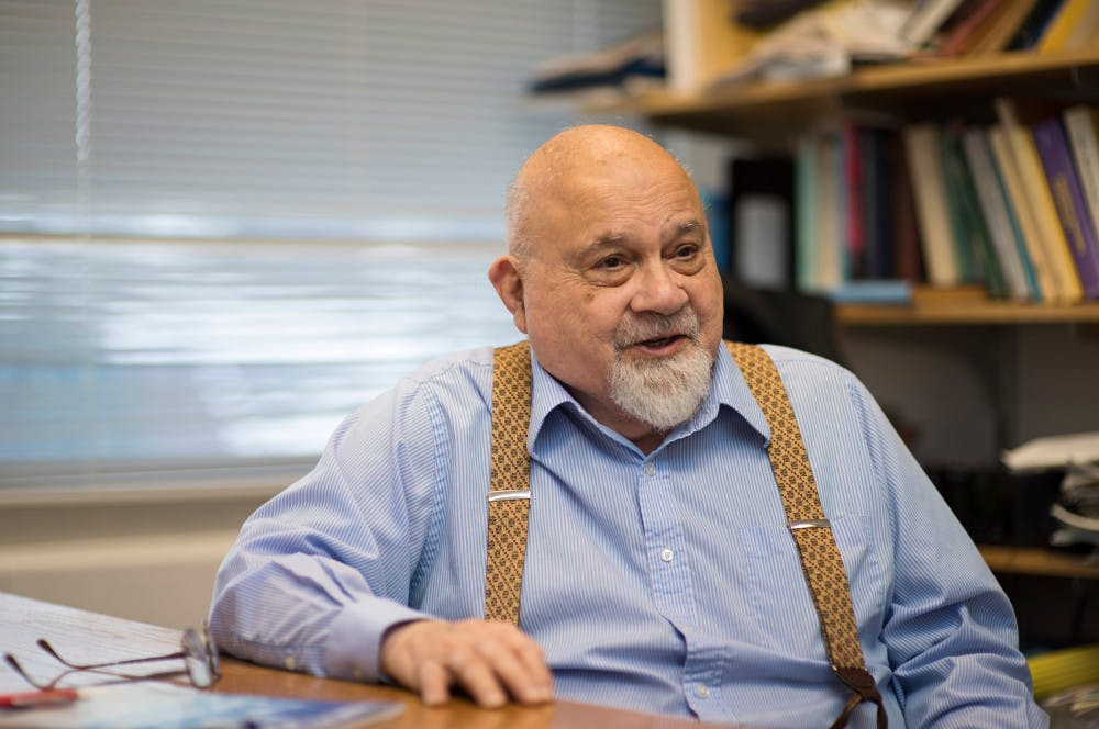 Pg-1-Professor-by-Daniel-Ra-Staff-photographer