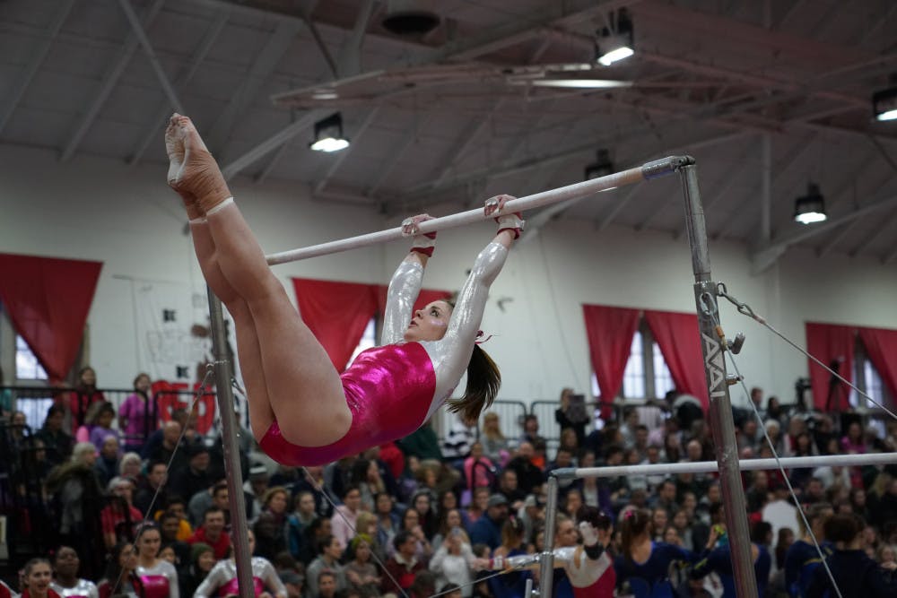 Pg-11-W-Gymnastics-by-Ben-Parker-Asst-Editor