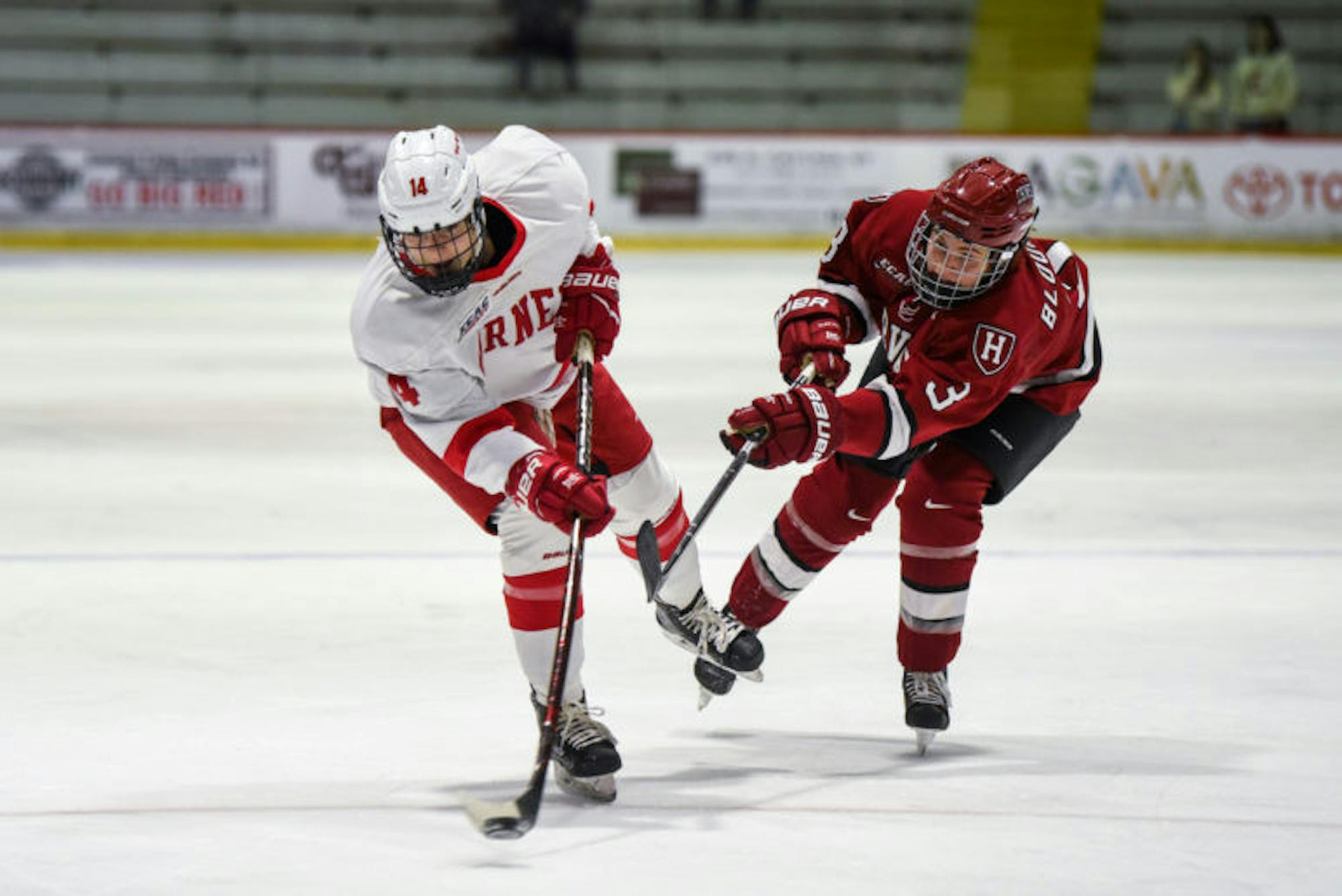 The women's ice hockey team claimed a 3-2 victory over Harvard for its second regular season victory on Friday. (Boris Tsang / Sun Assistant Photography Editor)