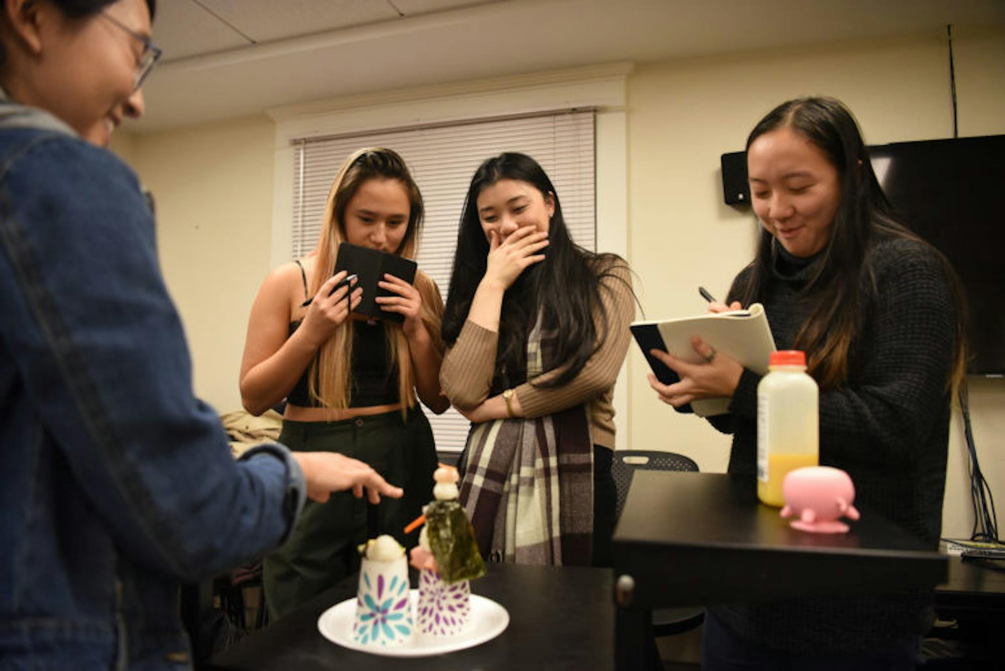 Samantha Chu ’22 presents her creation at the Cornell Asian Pacific Student Union’s first annual Asian Chopped culinary competition. (Boris Tsang / Sun Assistant Photography Editor)