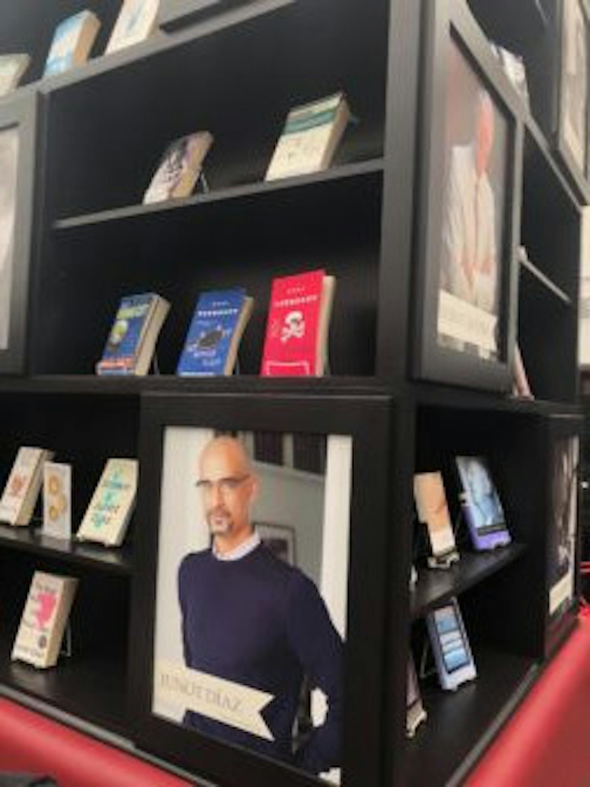 A display in The Cornell Store features a picture of Díaz and copies of some of his books.