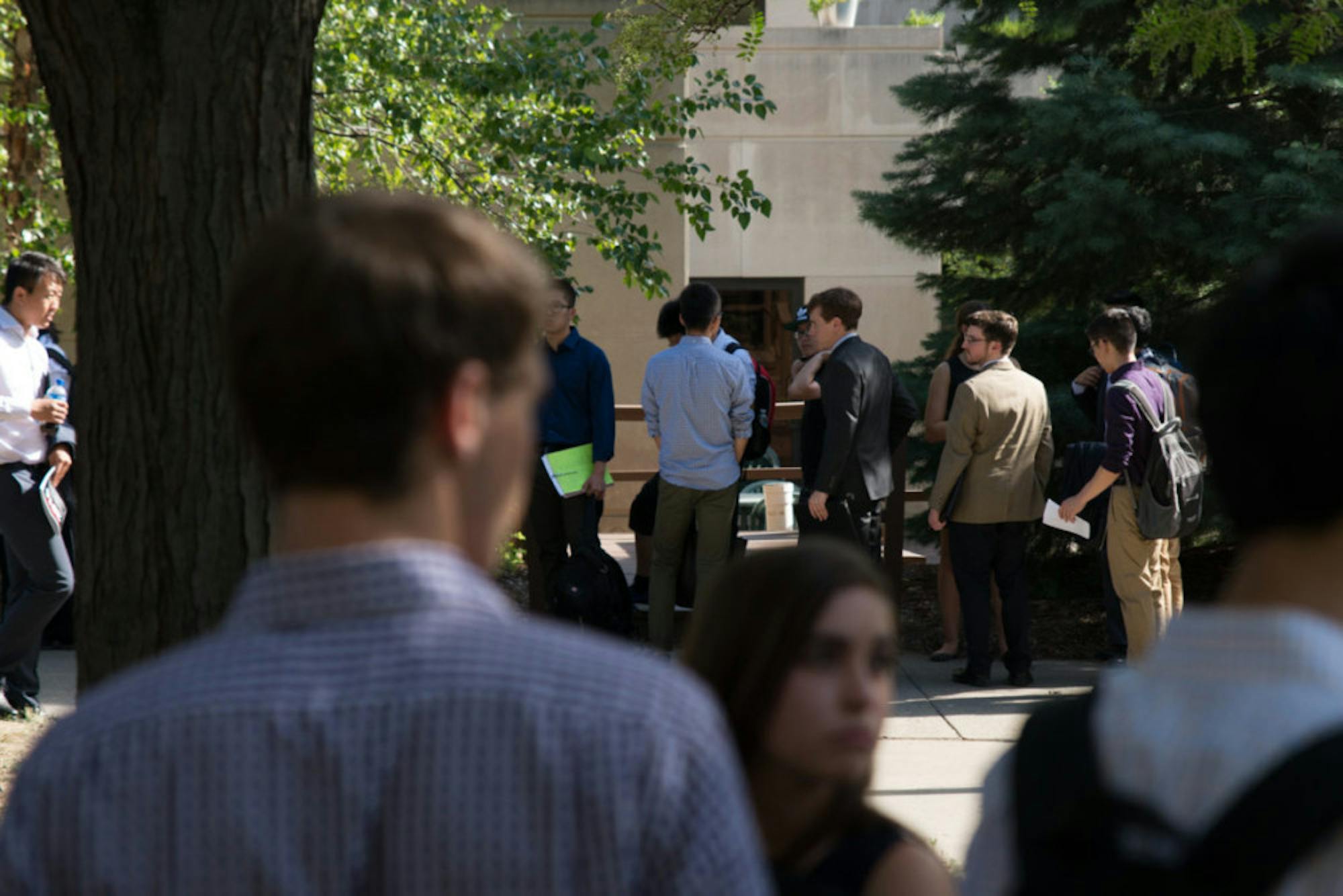 Limited space in the Statler Hotel forced students to line up outside, waiting to enter the career fair.