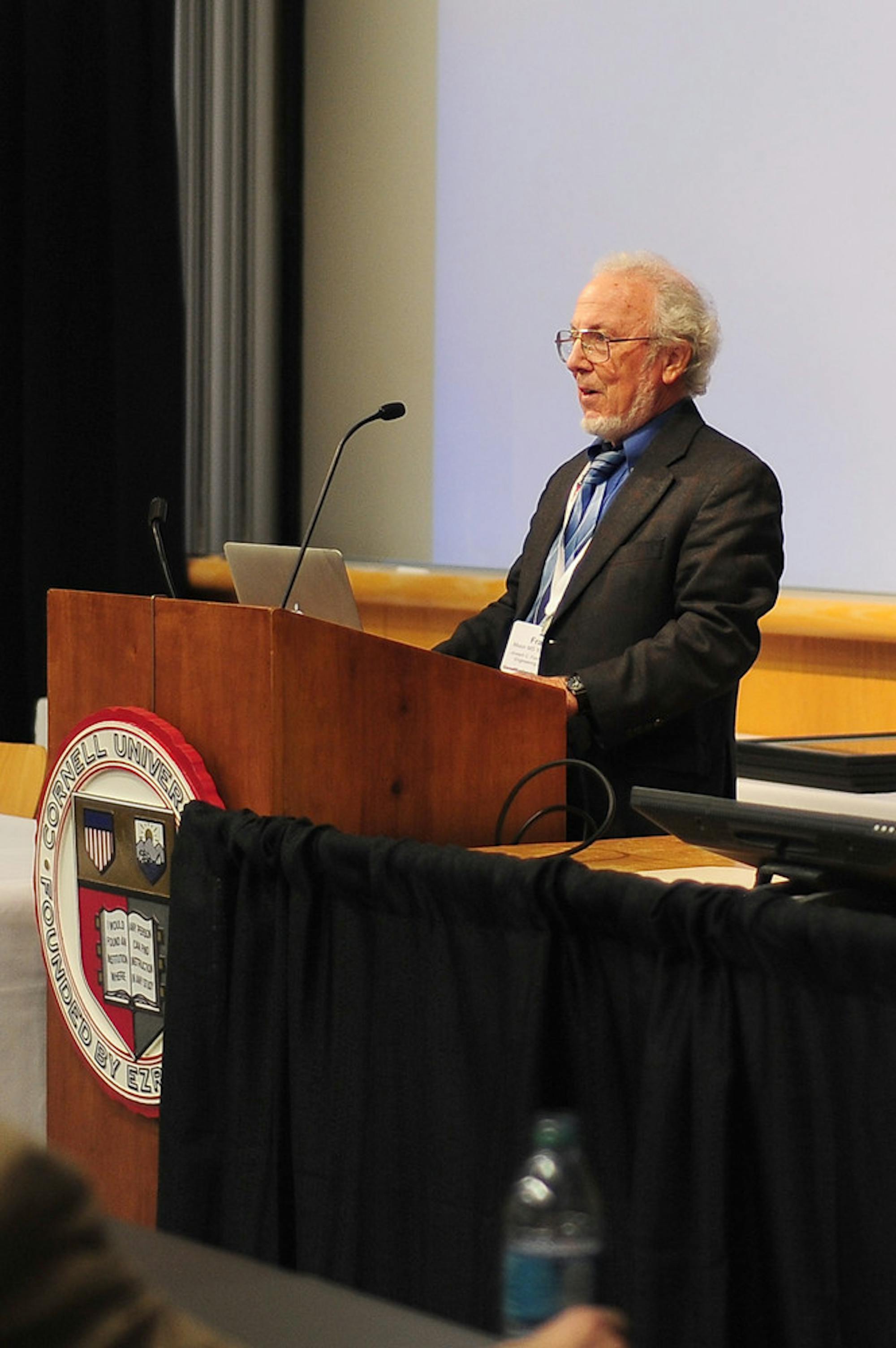 Prof. Emeritus Frank Moon, engineering, details the history of the engineering college Friday ( Brittney Chew / Sun News Photography Editor).
