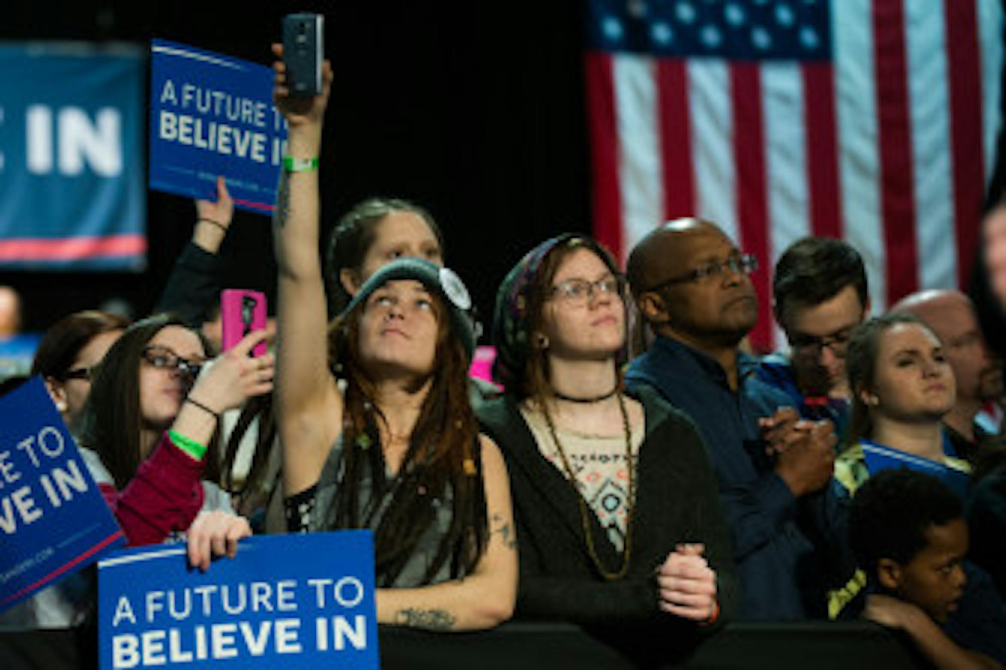 Supporters await the arrival of Sanders at a rally Tuesday.
