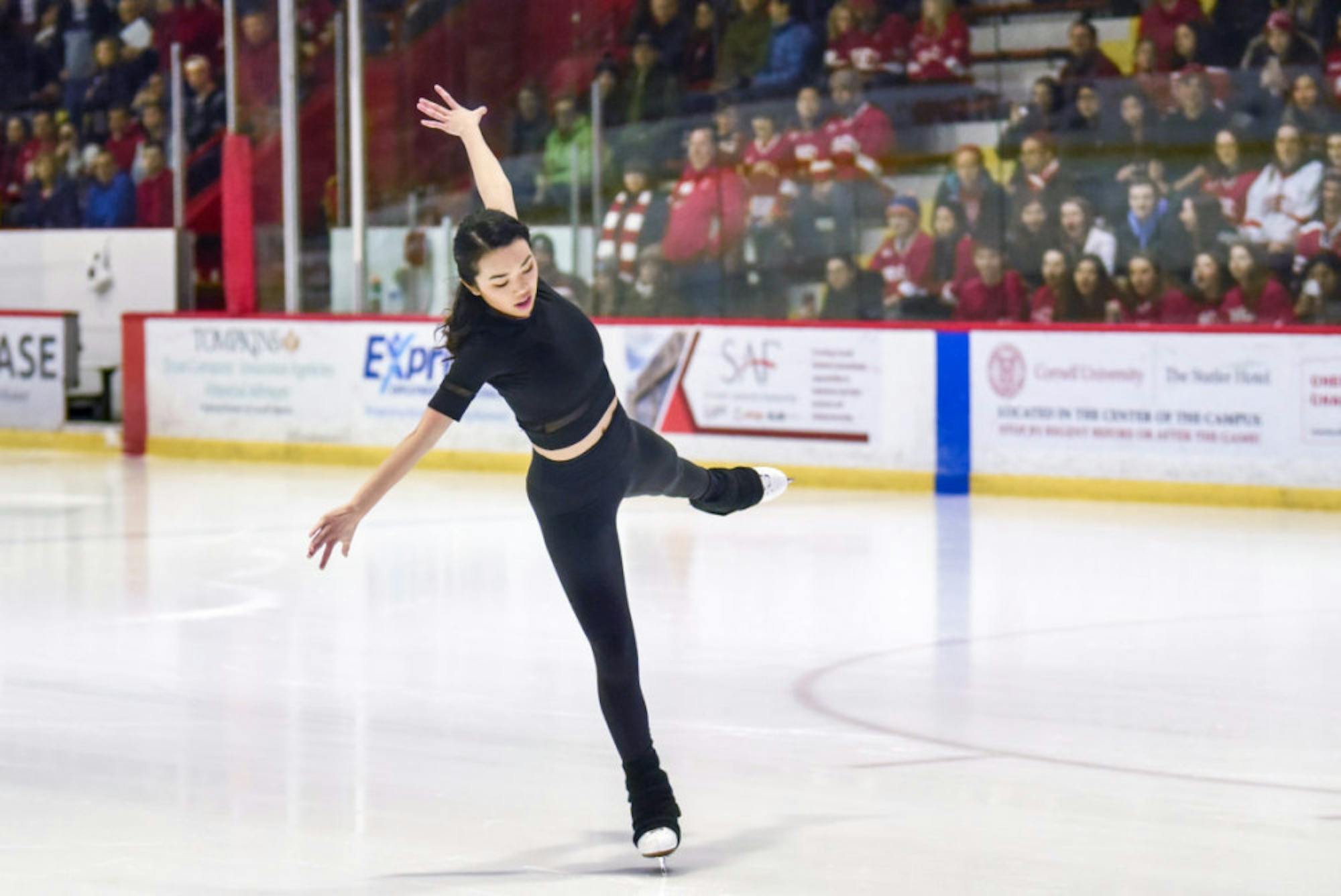 Karen Chen '23 performs at Lynah Rink after the first period of the men's hockey game against St. Lawrence on Saturday. (Boris Tsang/Sun Photography Editor)