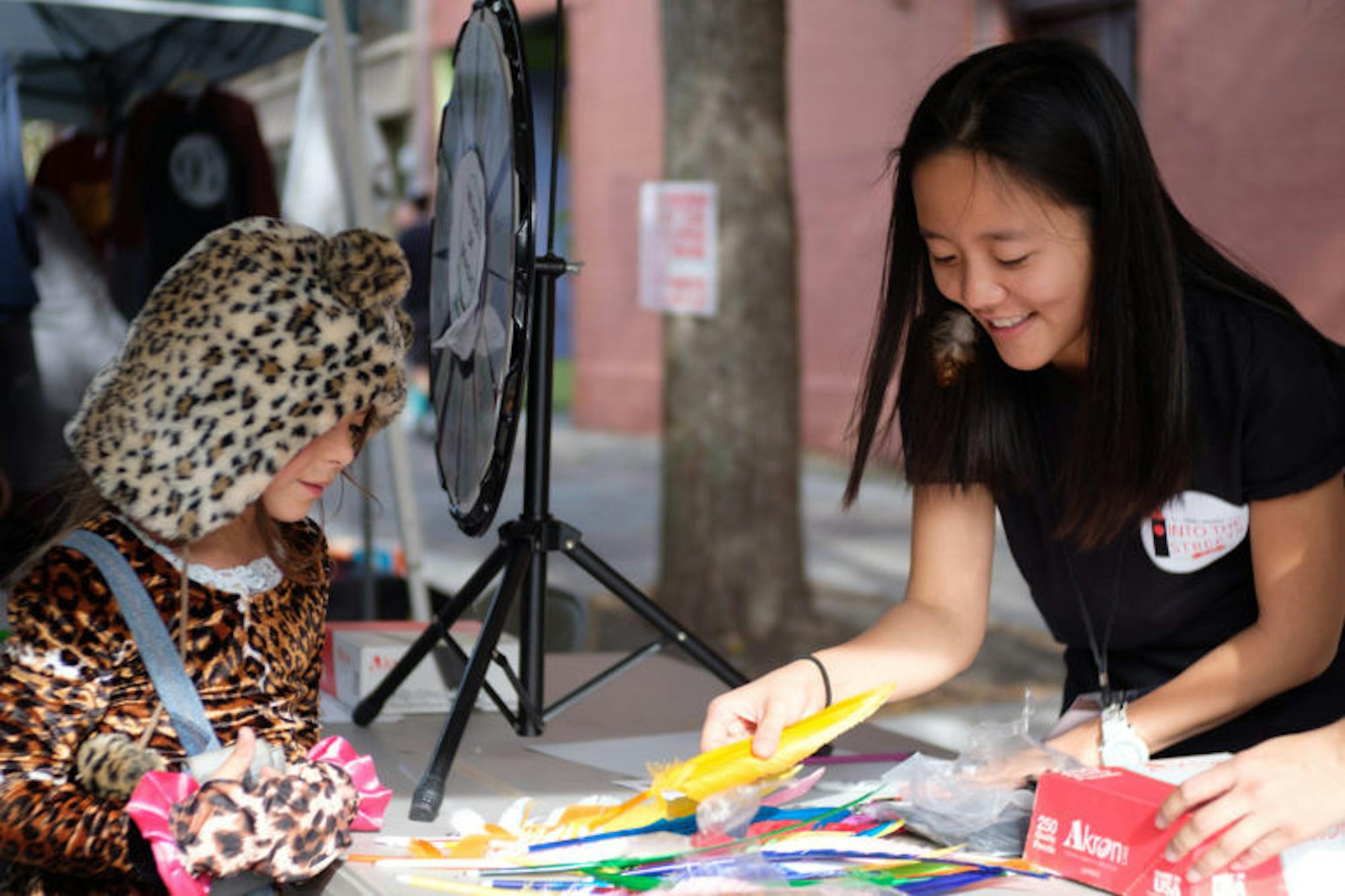 Into The Streets volunteers at downtown Ithaca on Wizarding Weekend, Saturday, 28 Oct. (Michael Suguitan / Sun Staff Photographer).