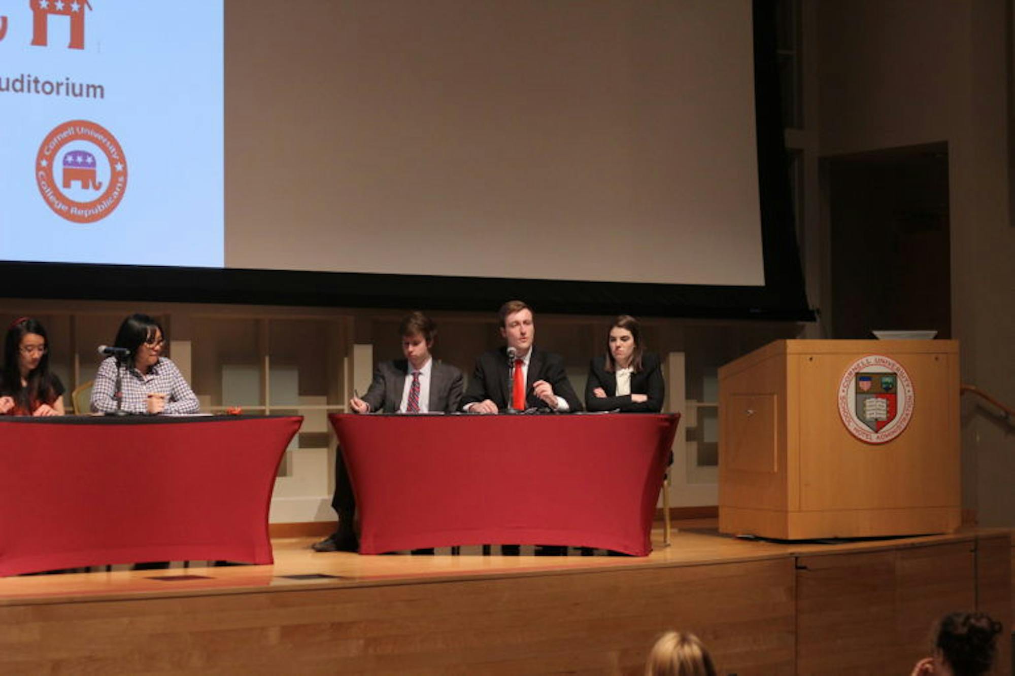 Austin McLaughlin '18 (left of three).