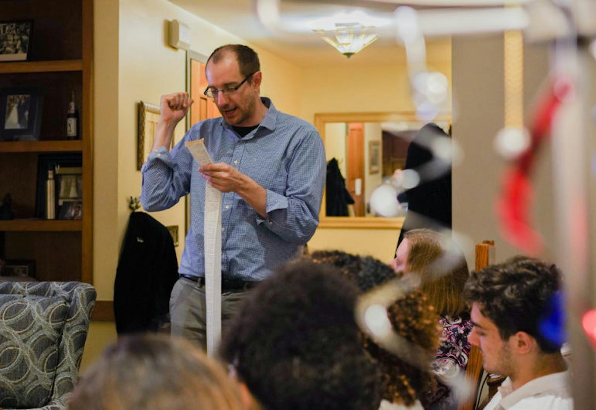 Community members gathered at Prof. Shorna Allred's apartment in Alice Cook House to follow live election results on Tuesday. (Jing Jiang / Sun Staff Photographer)
