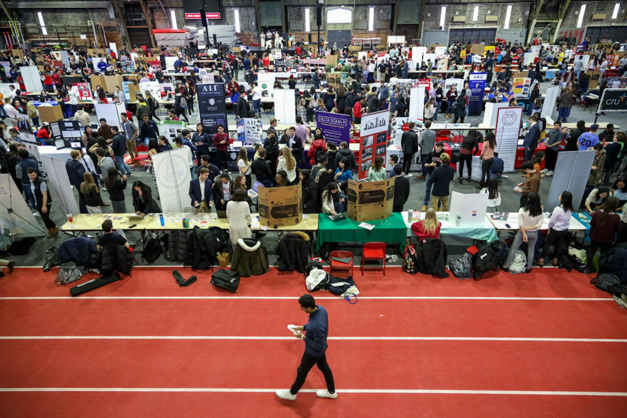 At Barton Hall, Students visit club booths at ClubFest this Sunday. Hosting over 1000 clubs and organizations, ClubFest provides students with the opportunity to check out on-campus groups. (Michael Wenye Li/Sun Senior Photographer)