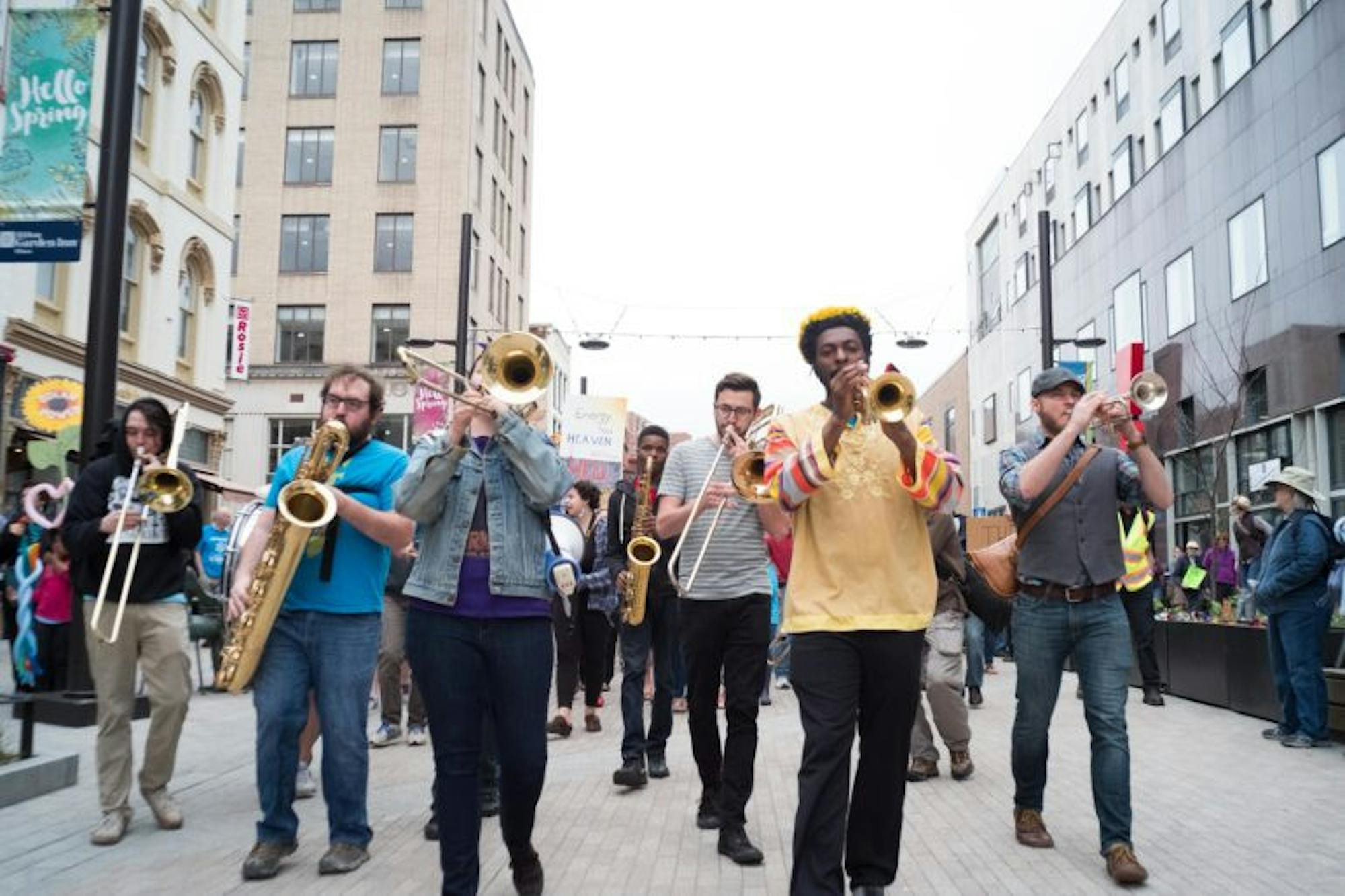 Demonstrators rallied at the Ithaca Commons and marched to The Space at Greenstar for the Climate March in recognition of Earth Day, 29 April.