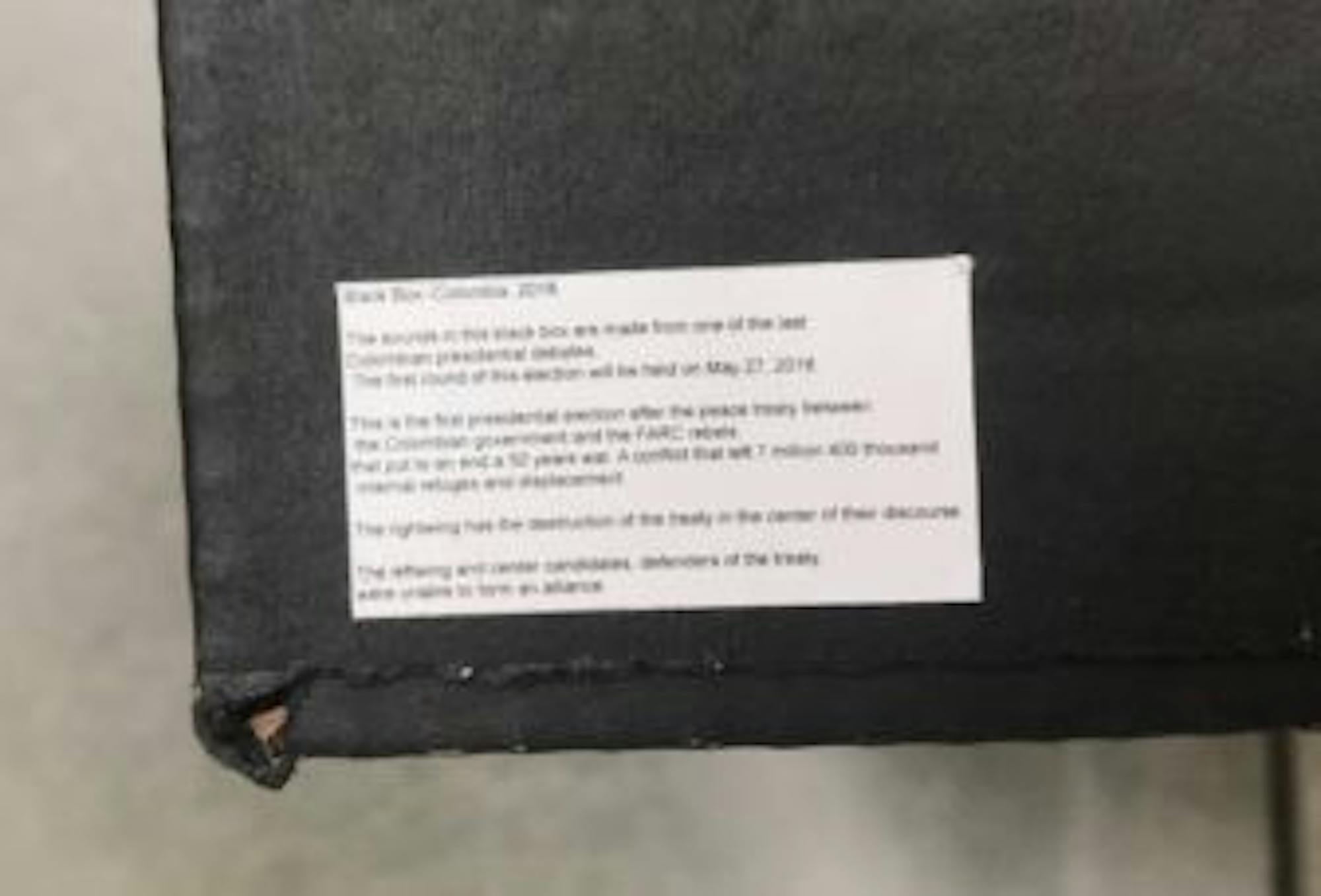 The box's information was printed in tiny text, making passerby have to closely examine it to understand.