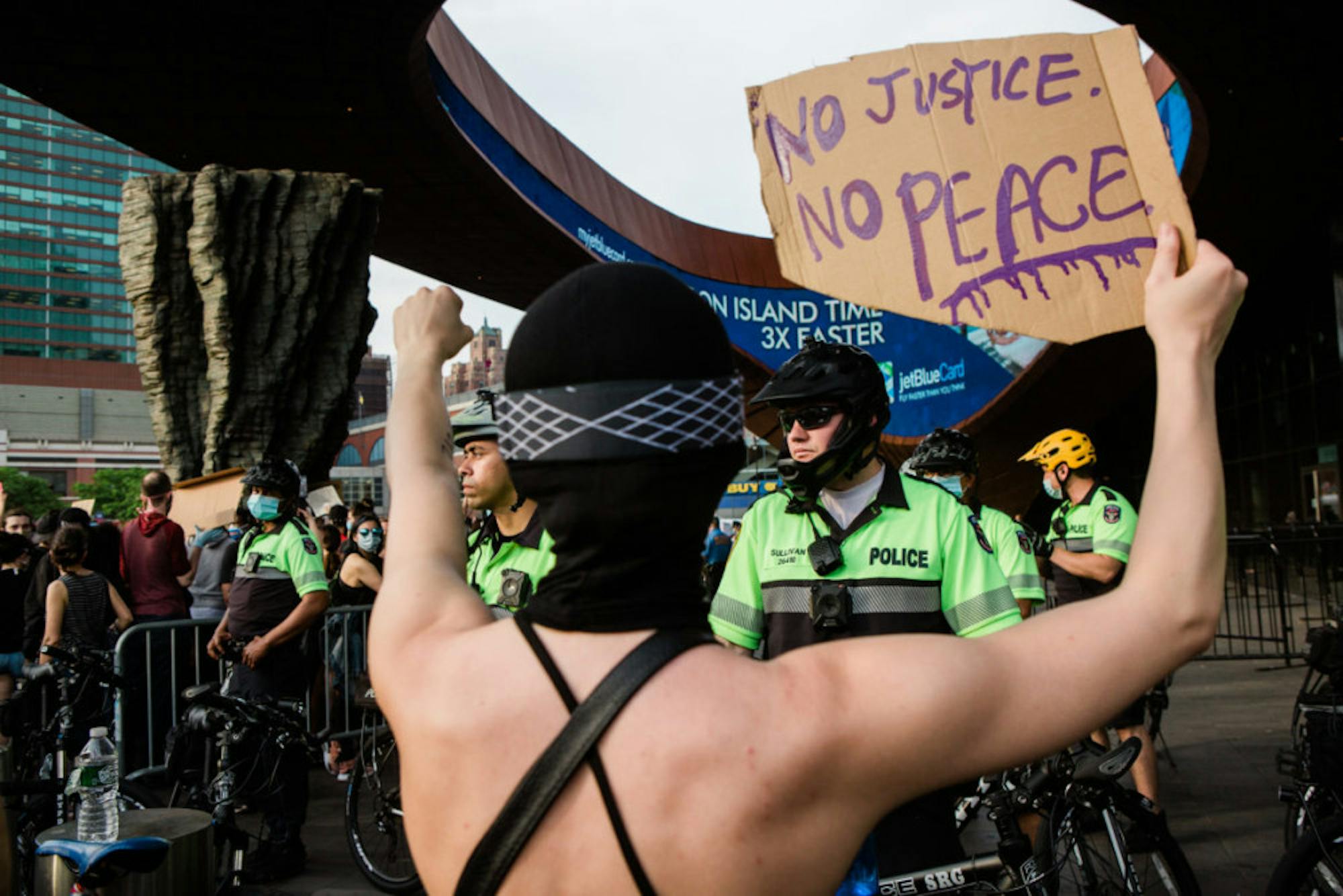 Demonstrators protest police brutality outside the Barclays Center in New York, May 29.