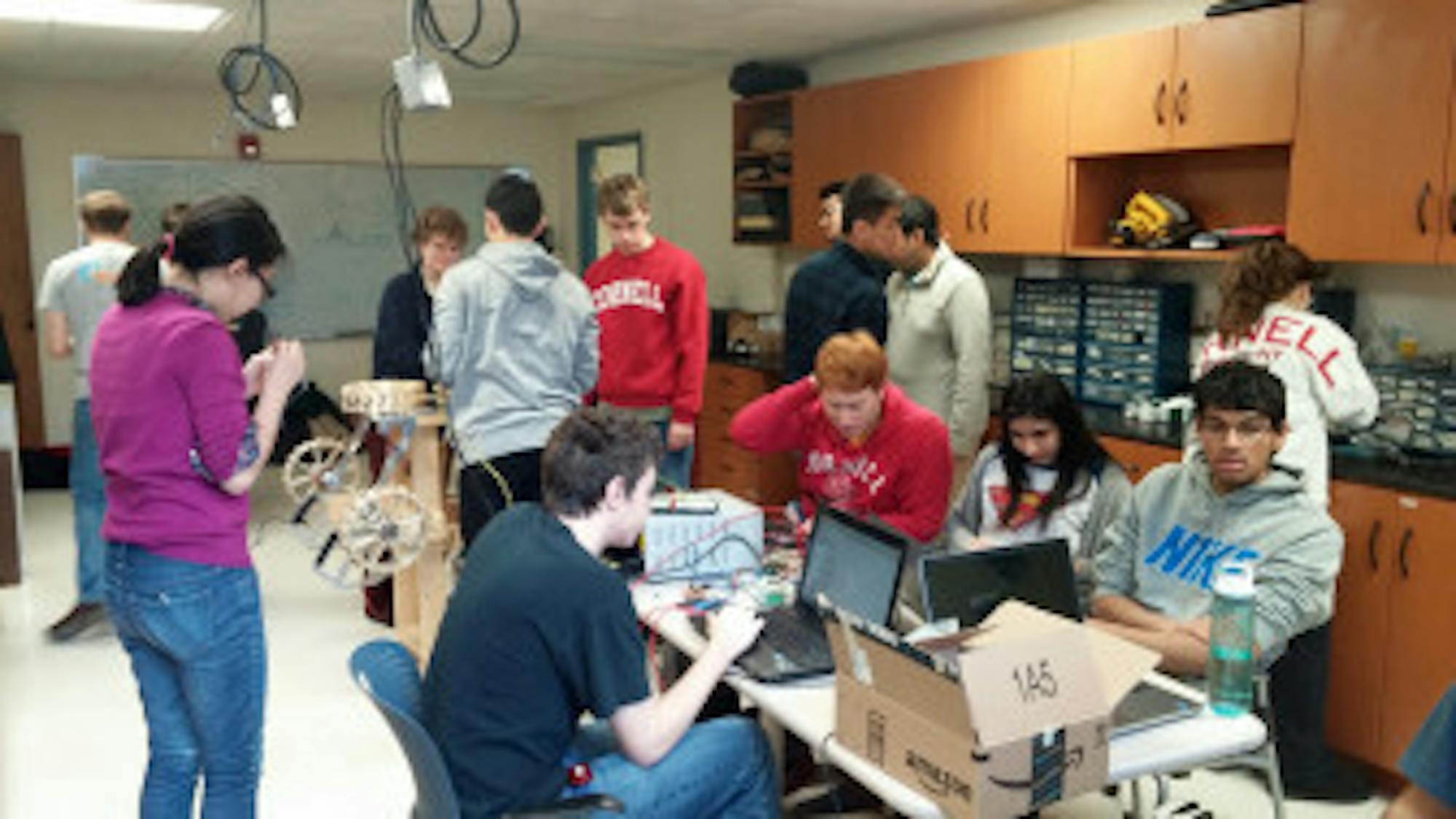 Members of the Mars rover team collaborate at a work session