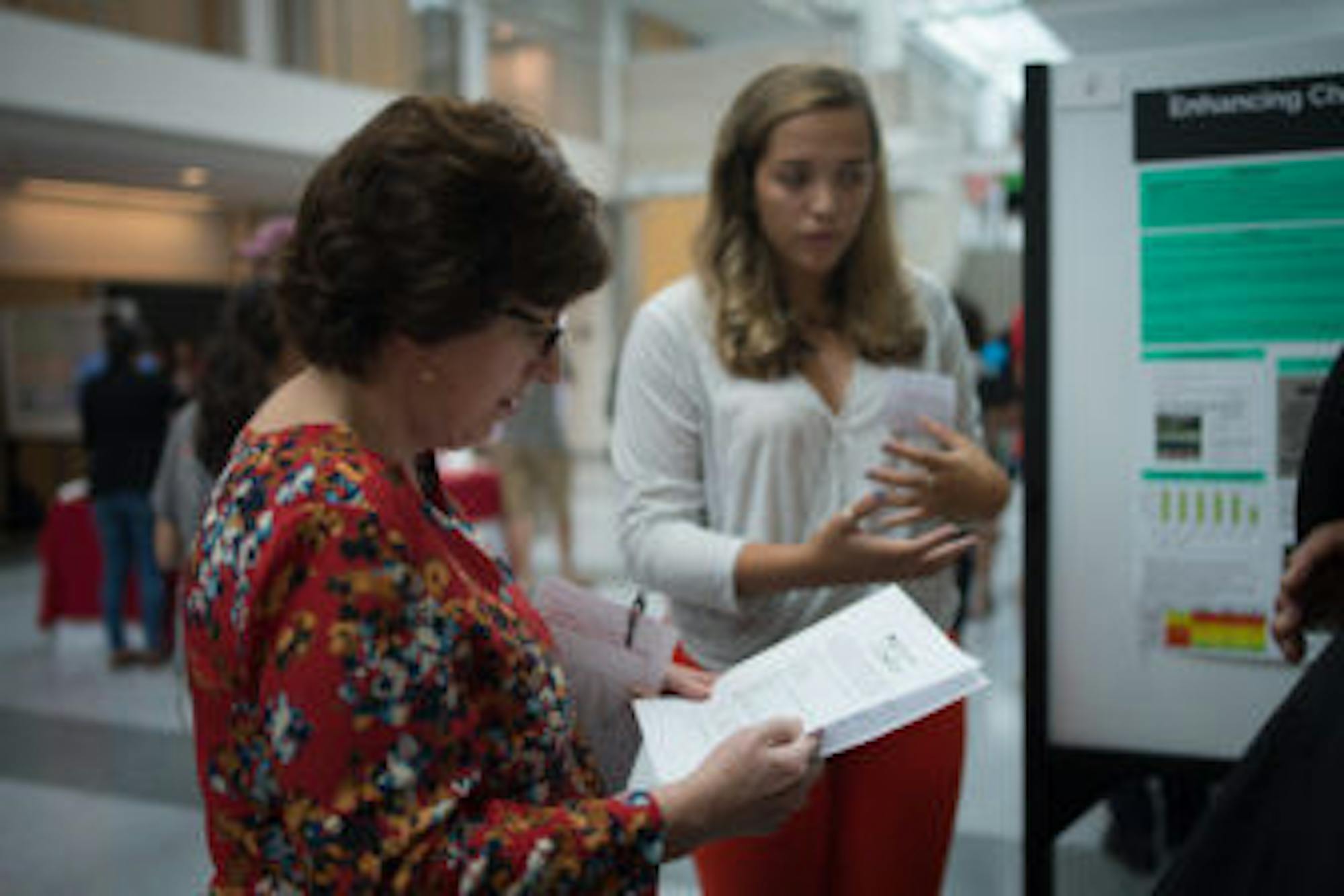 Martha Pollack speaks to Elizabeth Cavic '18 in the Physical Sciences Building, August 24th, 2017.