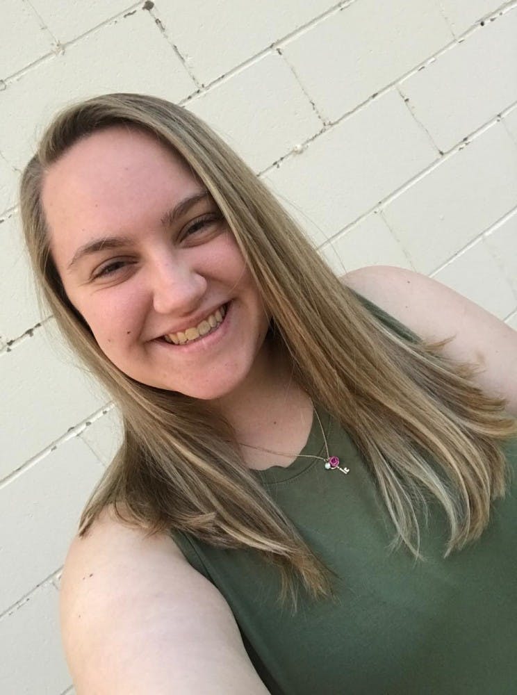 taylor rainier headshot