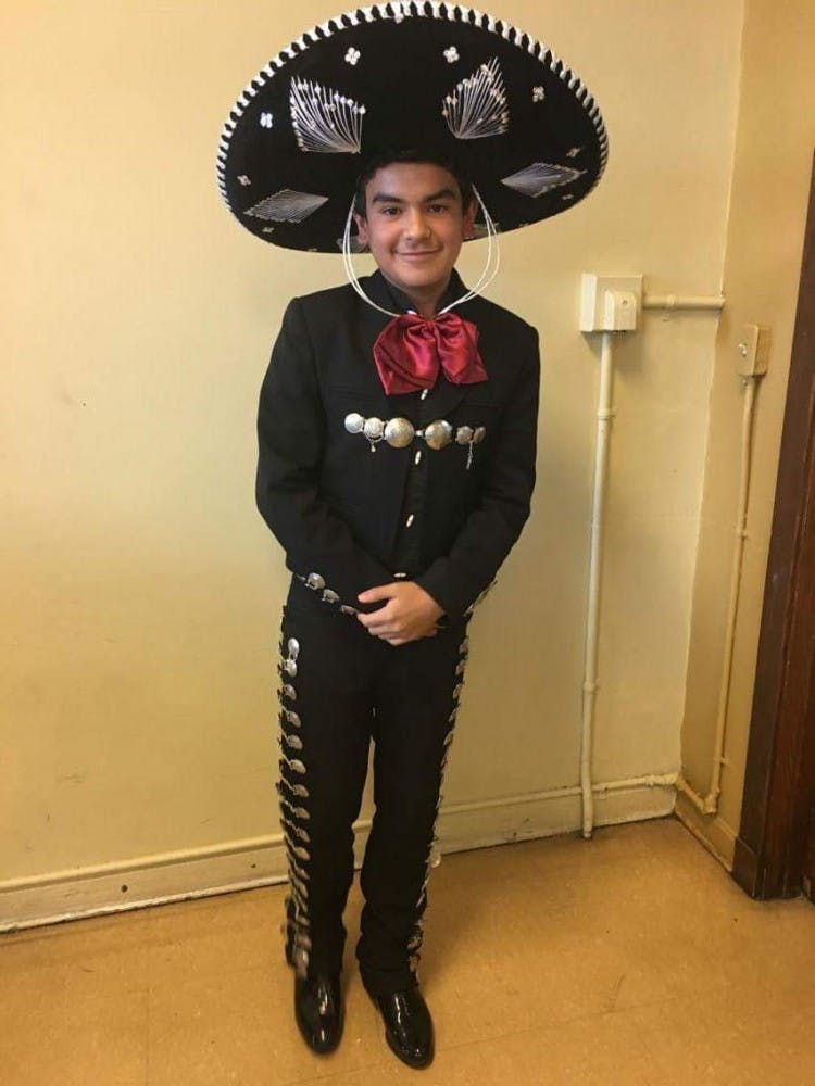 Freshman&nbsp;Emiliano Cantu&nbsp;dresses up for Latino week.