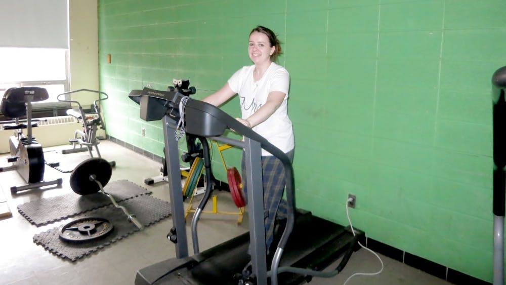 Douglass resource teacher Amanda Morris works out a treadmill during her prep time.