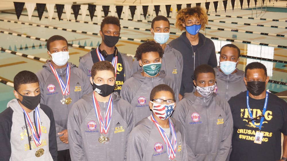 <p>King’s seven-member boys swim team wins the city championship. Courtesy photo.</p>