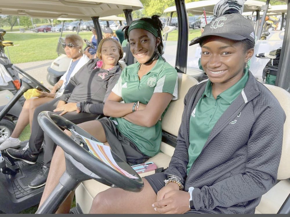  Cass Tech golfers Sydney Evans and Kennedy Watts with Coach Jo. Photo by Fay Watts.