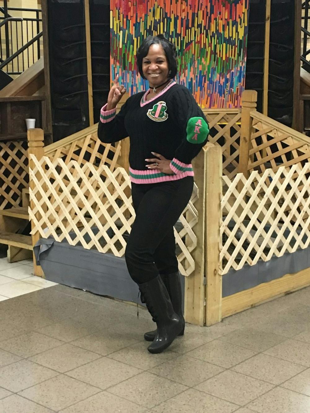 <p>Lisa McMurtry poses in her AKA Sorority gear at East English Village.</p>