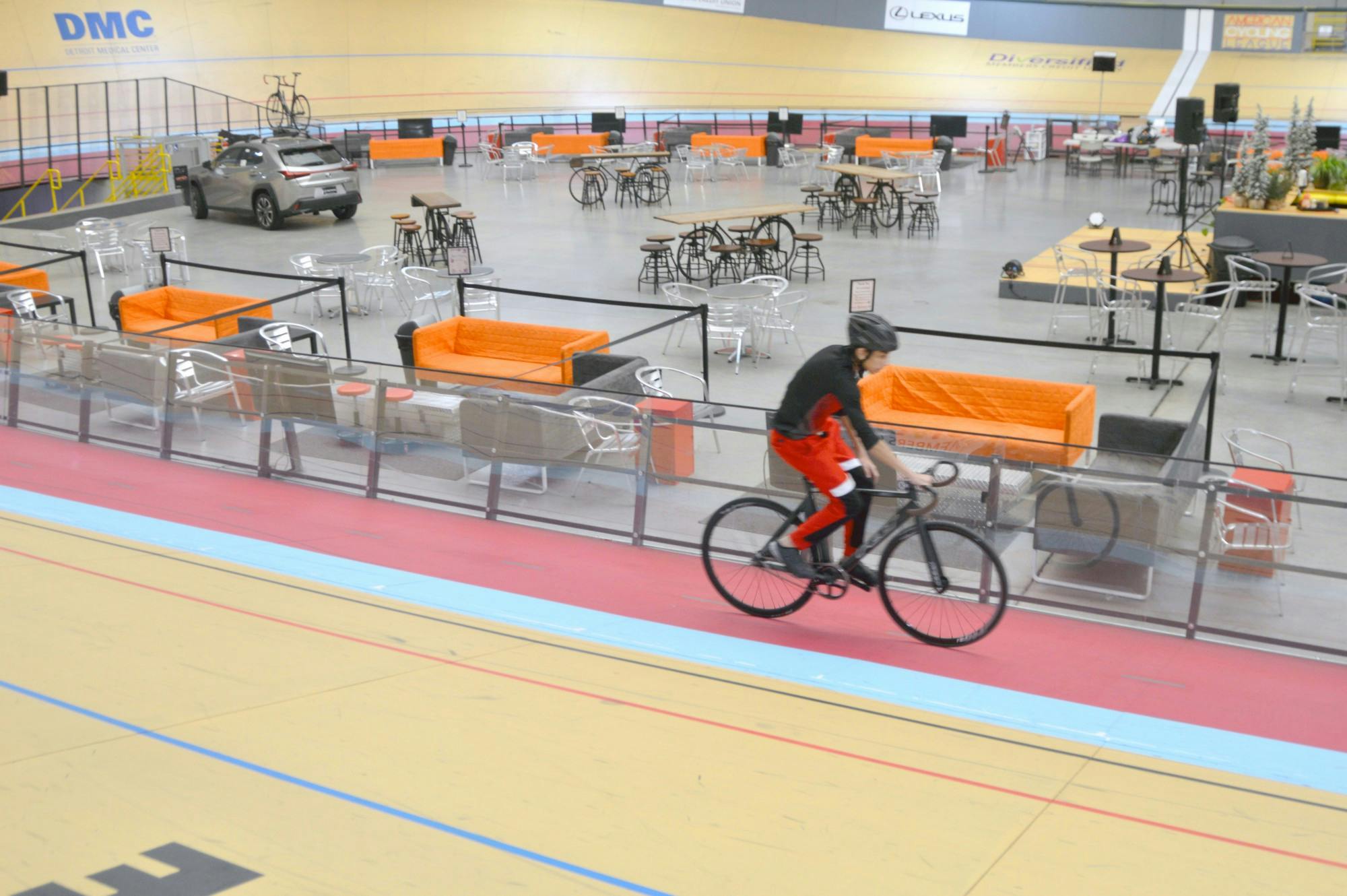BCHS student Jubair Ahmed taking a ride on the Lexus Velodrome track. The white dome structure sits in the shadows of BCHS.
