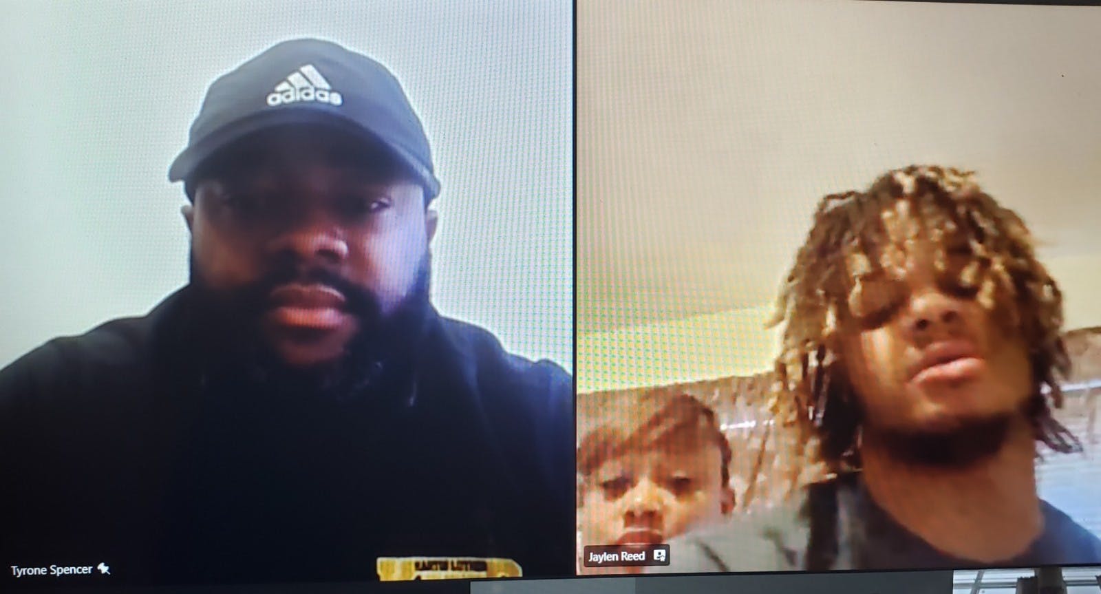 King football coach Tyrone Spencer with senior Jaylen Reed on Signing Day. Reed will play at Penn State in the fall.