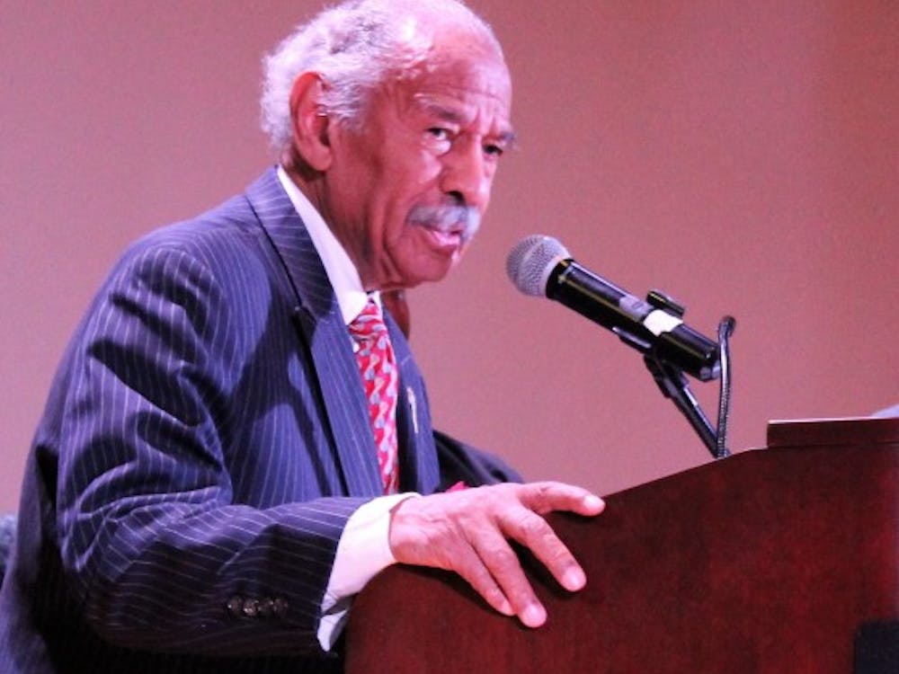 Congressman John Conyers addresses a packed auditorium with words of encouragement about unity for all people.