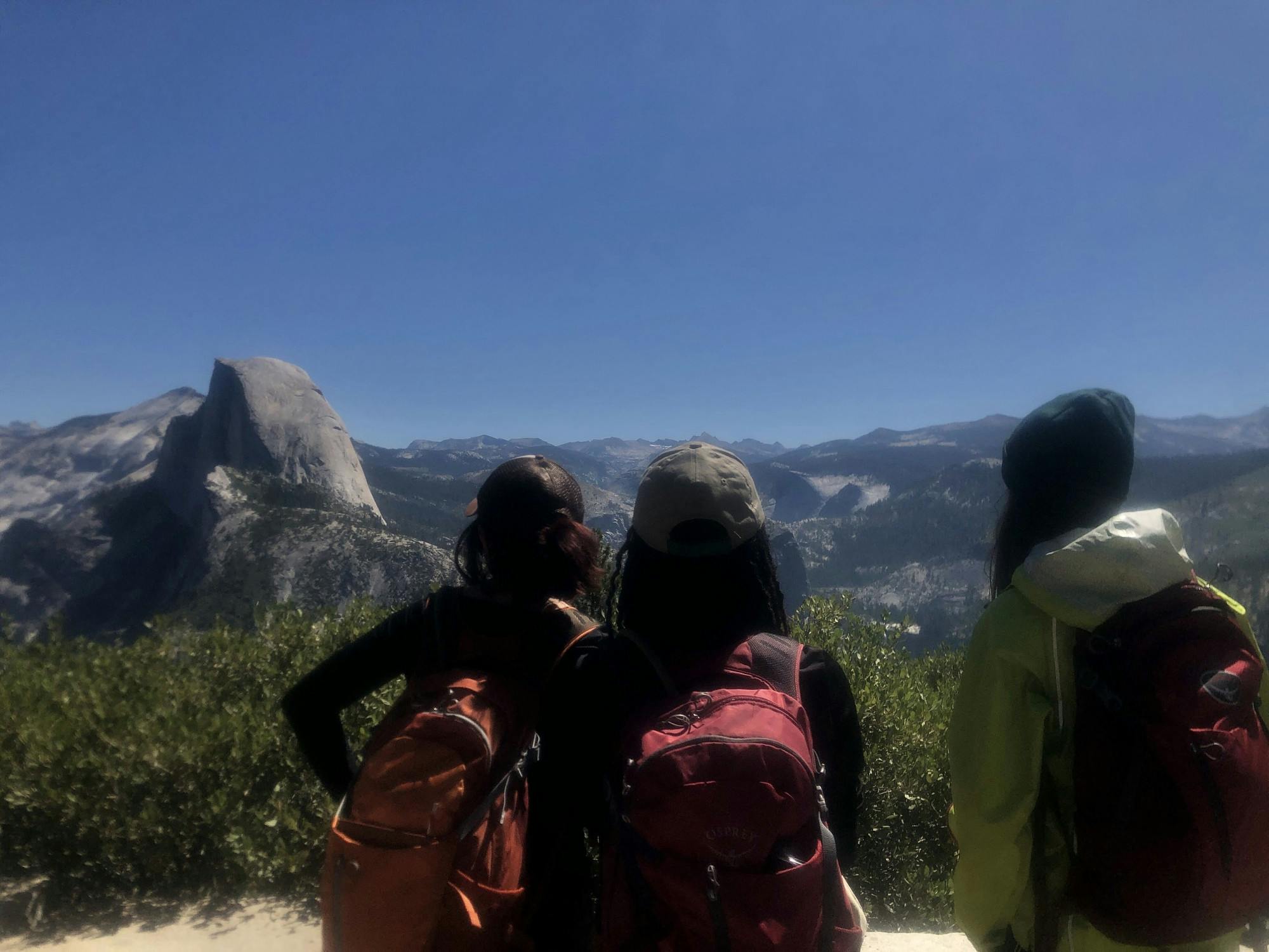 Three Cass Tech Outdoor Adventure Club members admire the Yosemite mountains. Courtesy photo.