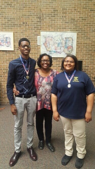 Nikolas Huey and Kharriane Gray pictured with Allayne Woods at a the Palazzo Strozzi Foundation Scholarship Banquet. Woods inspired both Huey and Gray to submit essays for the opportunity to travel to Italy.
