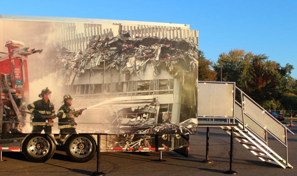 This is a depiction of firefighters putting out a fire, hours later after the attack.