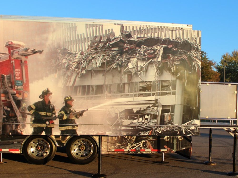 This is a depiction of firefighters putting out a fire, hours later after the attack.